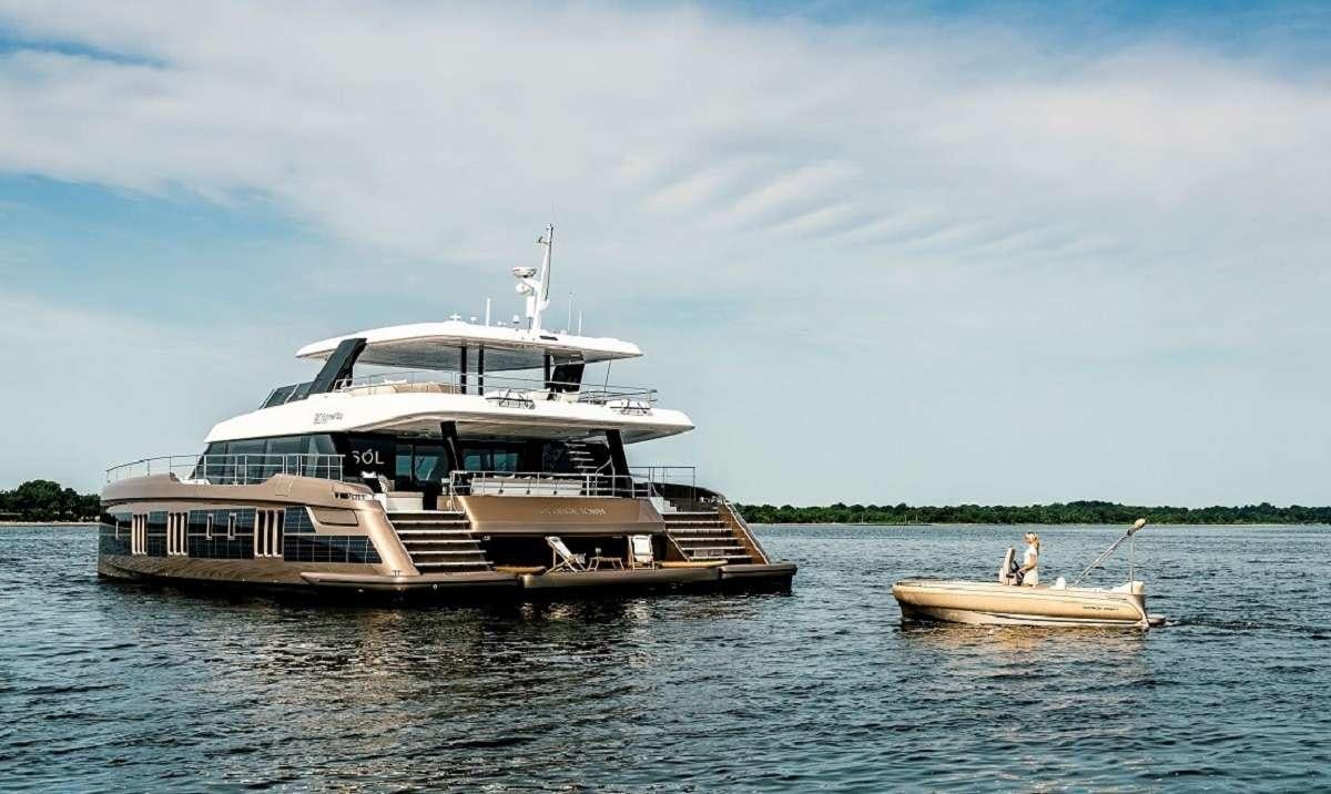 a boat and a boat in the water aboard SOL Yacht for Charter