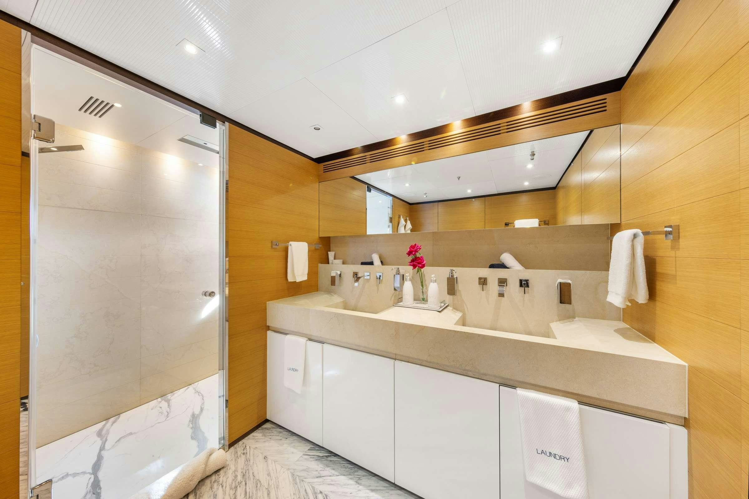 a bathroom with a large shower aboard MISCHIEF 1 Yacht for Charter