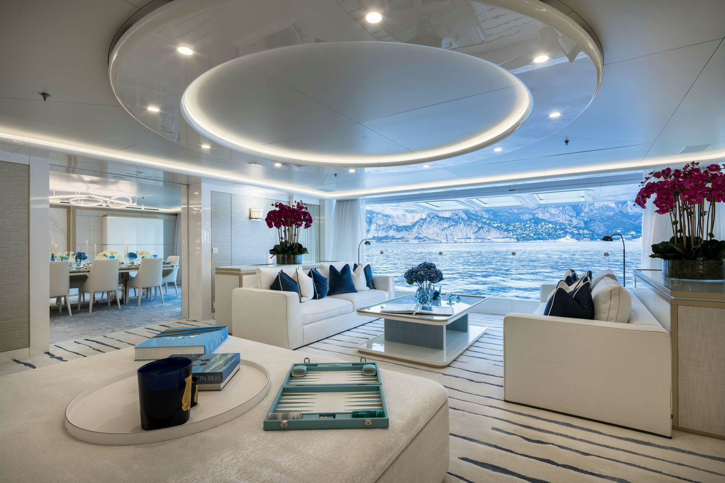 a modern living room with a large glass ceiling aboard CORAL OCEAN Yacht for Charter