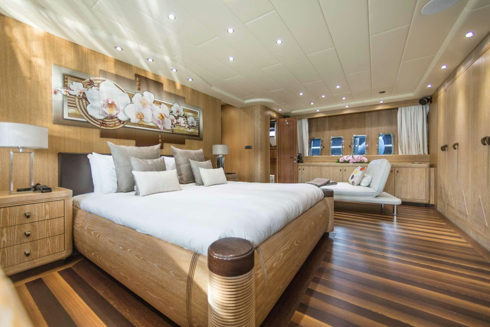 a large bed in a room aboard JFF Yacht for Charter