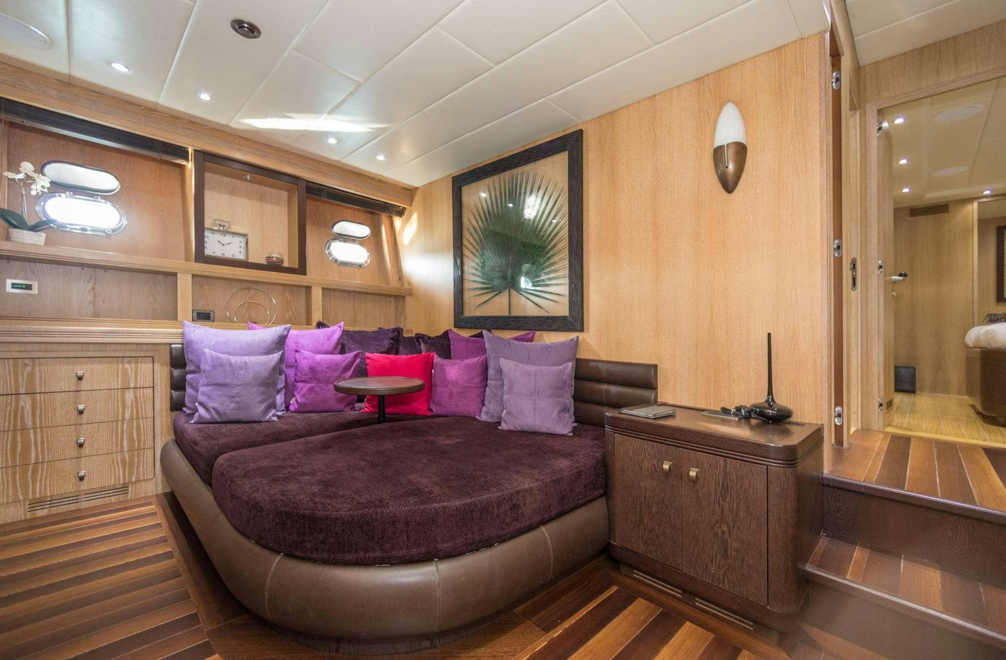 a large bed in a room aboard JFF Yacht for Charter