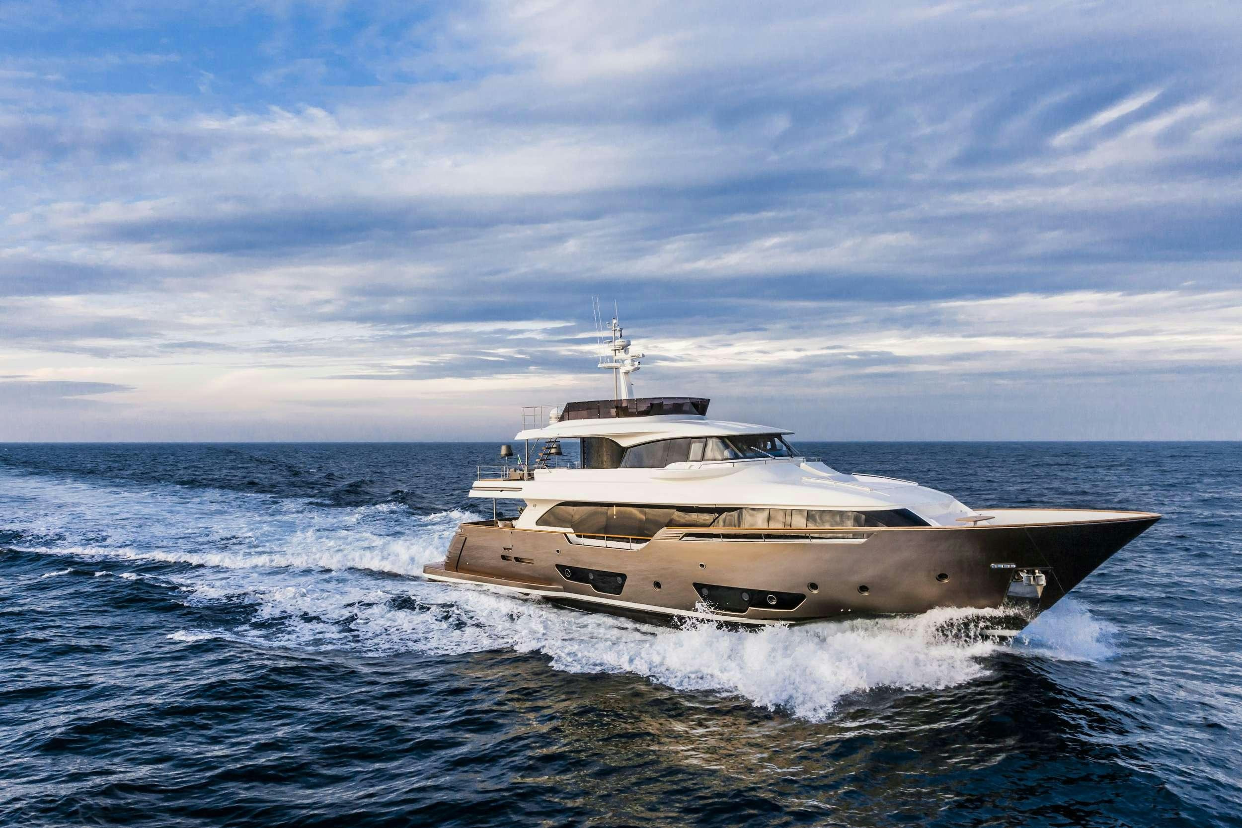 a white yacht on the water aboard YVONNE Yacht for Charter