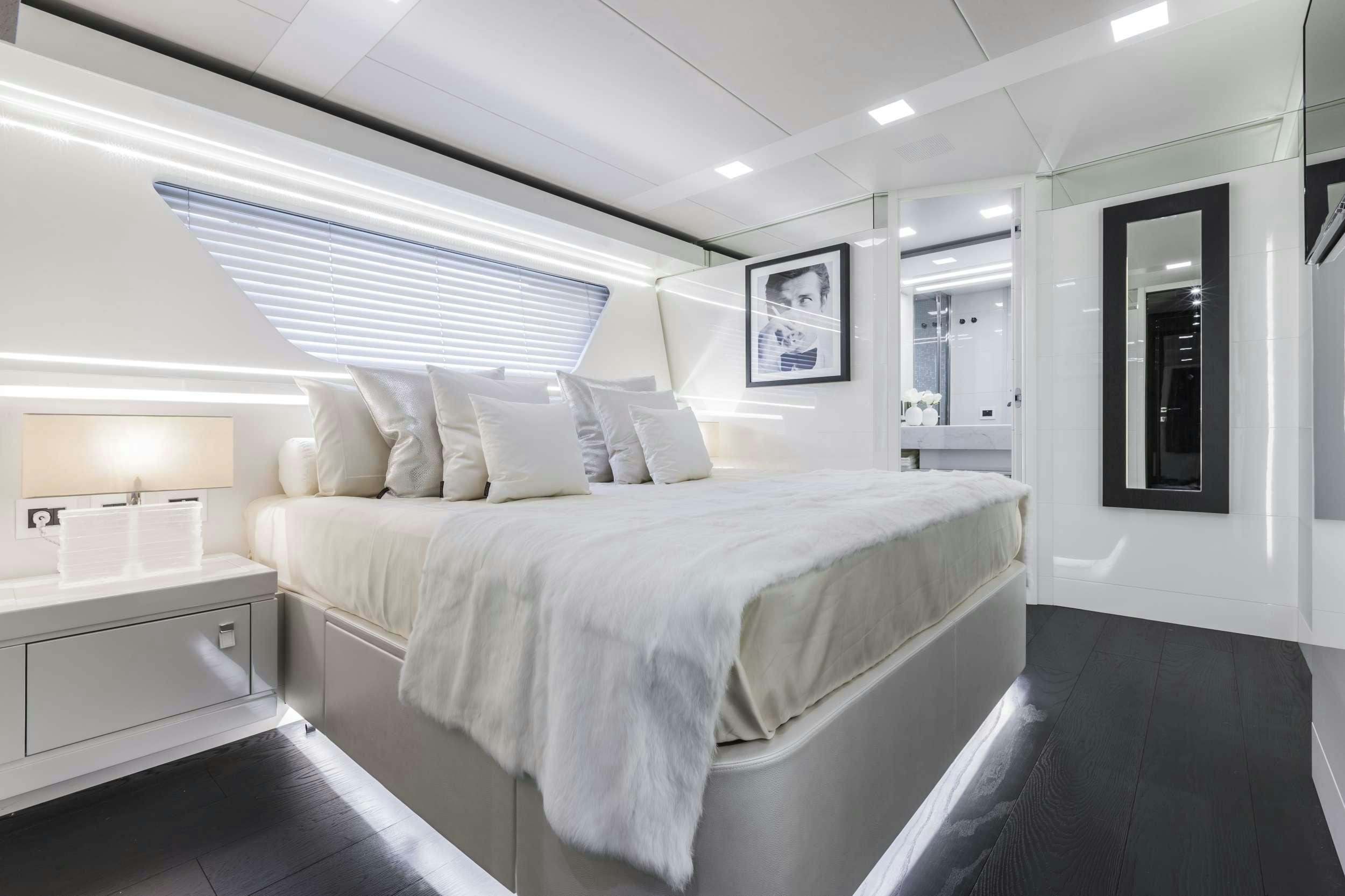 a bed in a room aboard YVONNE Yacht for Charter
