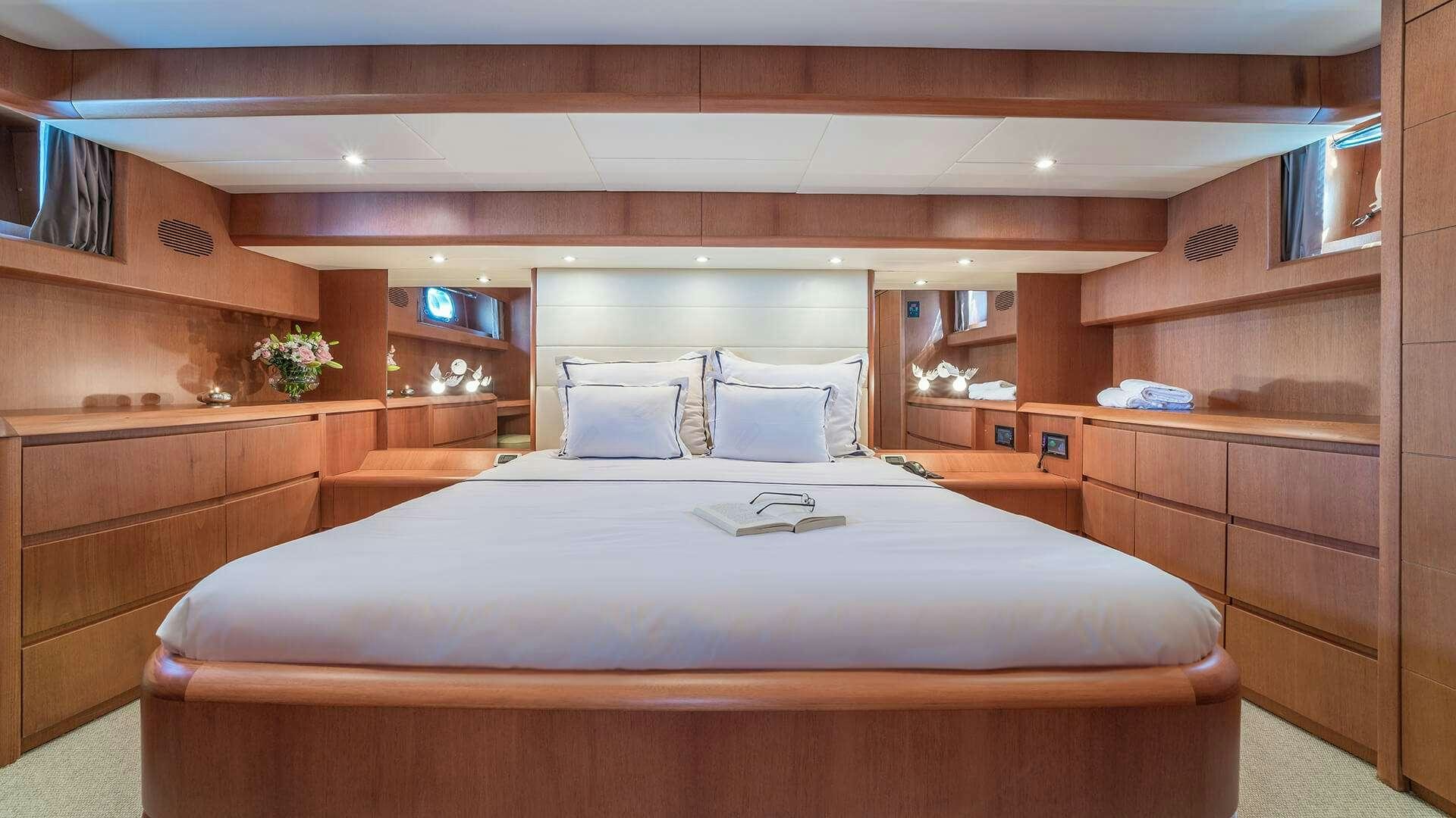 a bed in a room aboard JANTAR Yacht for Charter