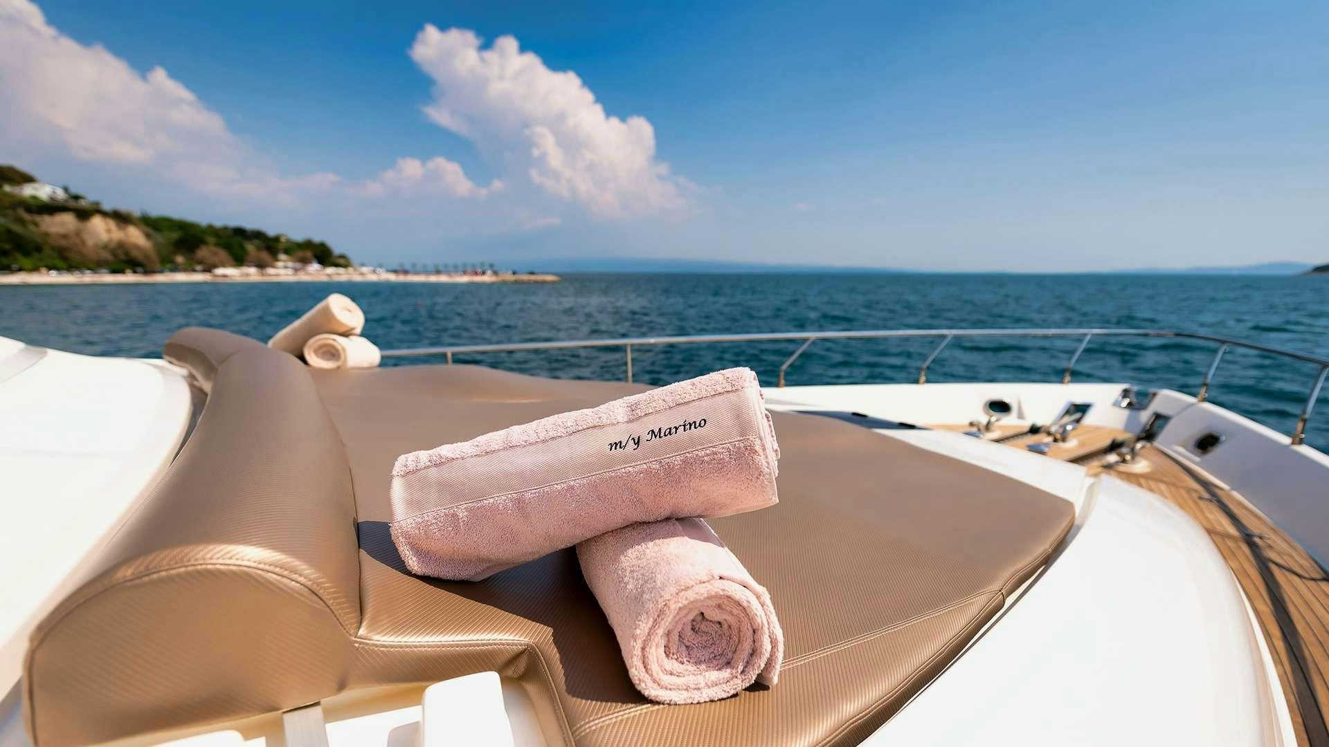 a pair of feet on a boat aboard M/Y MARINO Yacht for Charter