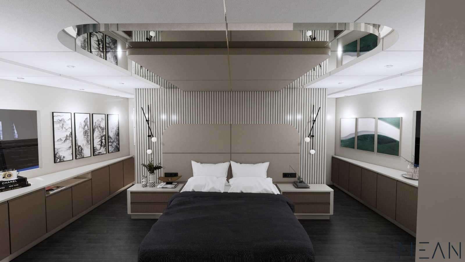 a room with a bed and a desk aboard NORTH WIND Yacht for Charter