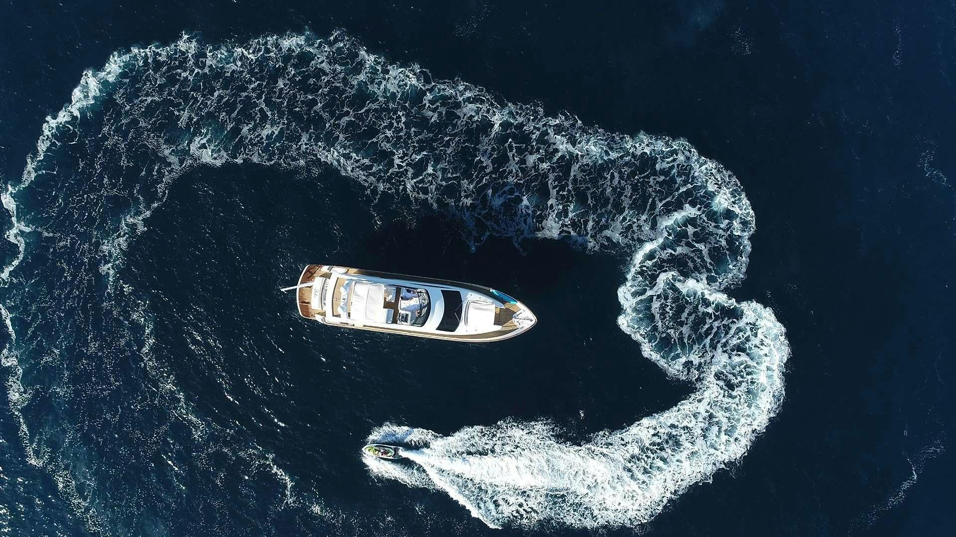 a boat in the ocean aboard PHOENIX Yacht for Charter