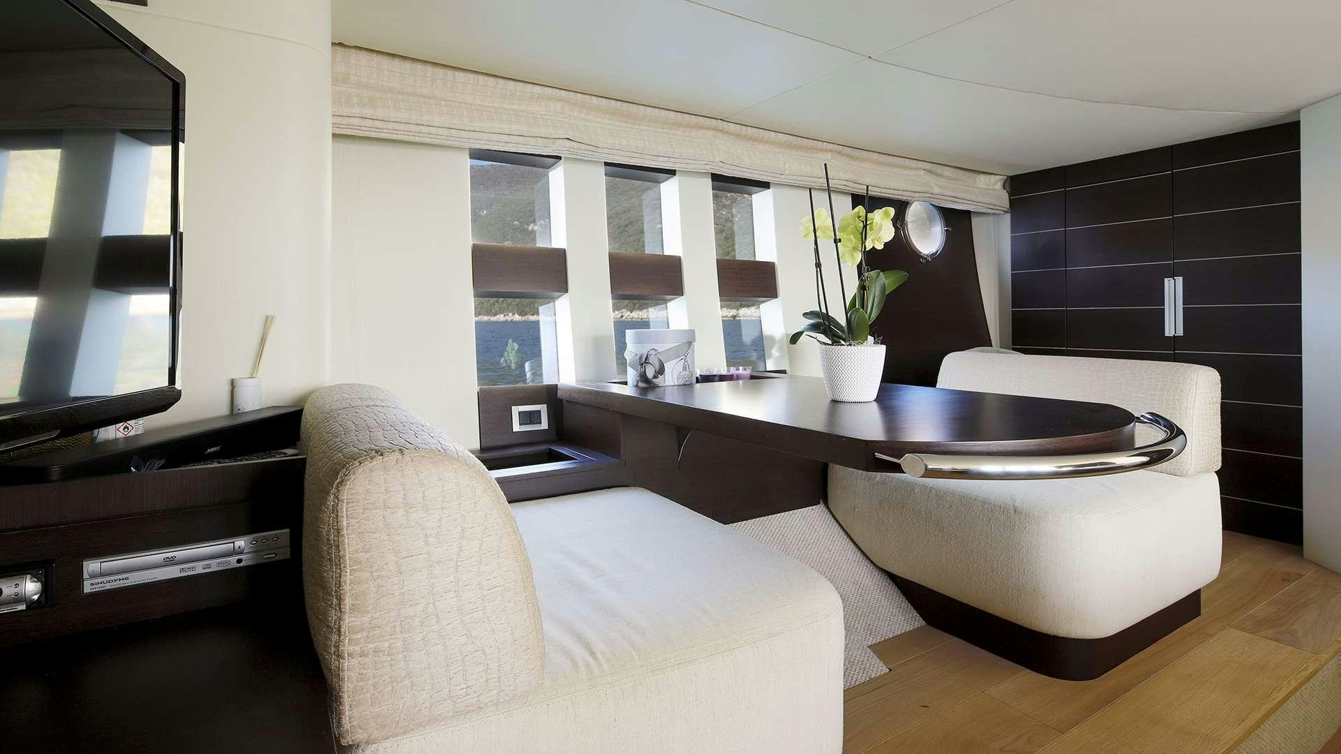 a modern looking living room aboard M/Y MAORO Yacht for Charter
