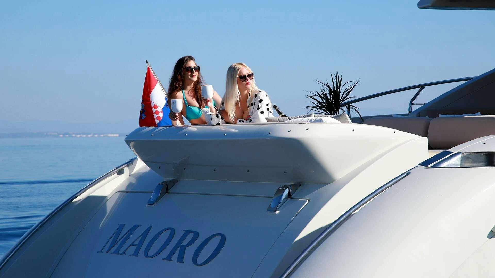 a group of women on a boat aboard M/Y MAORO Yacht for Charter