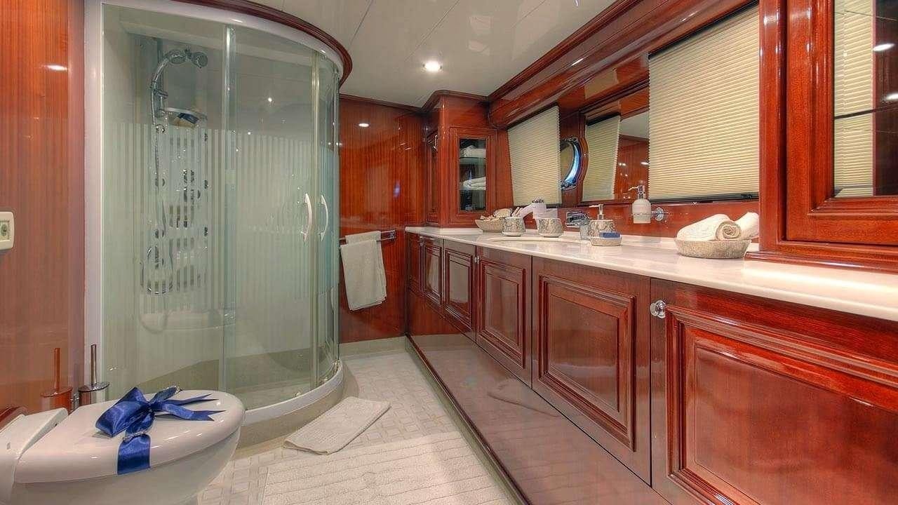 a bathroom with a large shower aboard PERFORMANCE FEE Yacht for Charter
