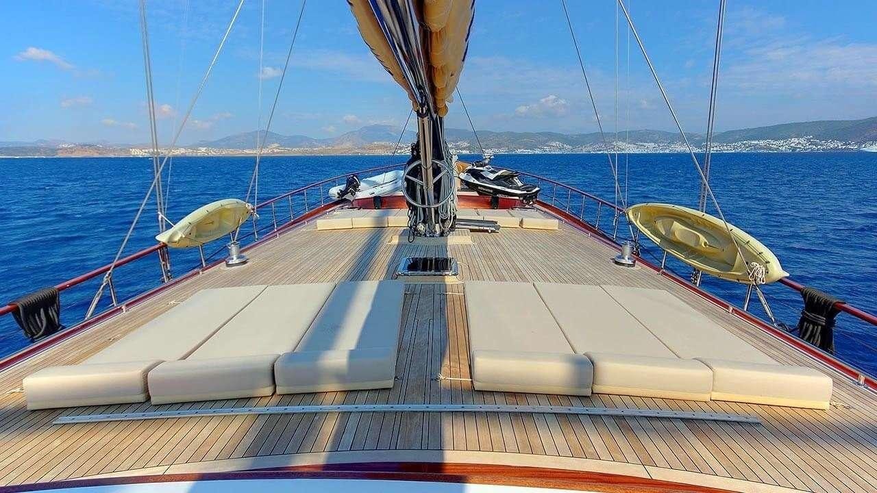 a boat on the water aboard PERFORMANCE FEE Yacht for Charter