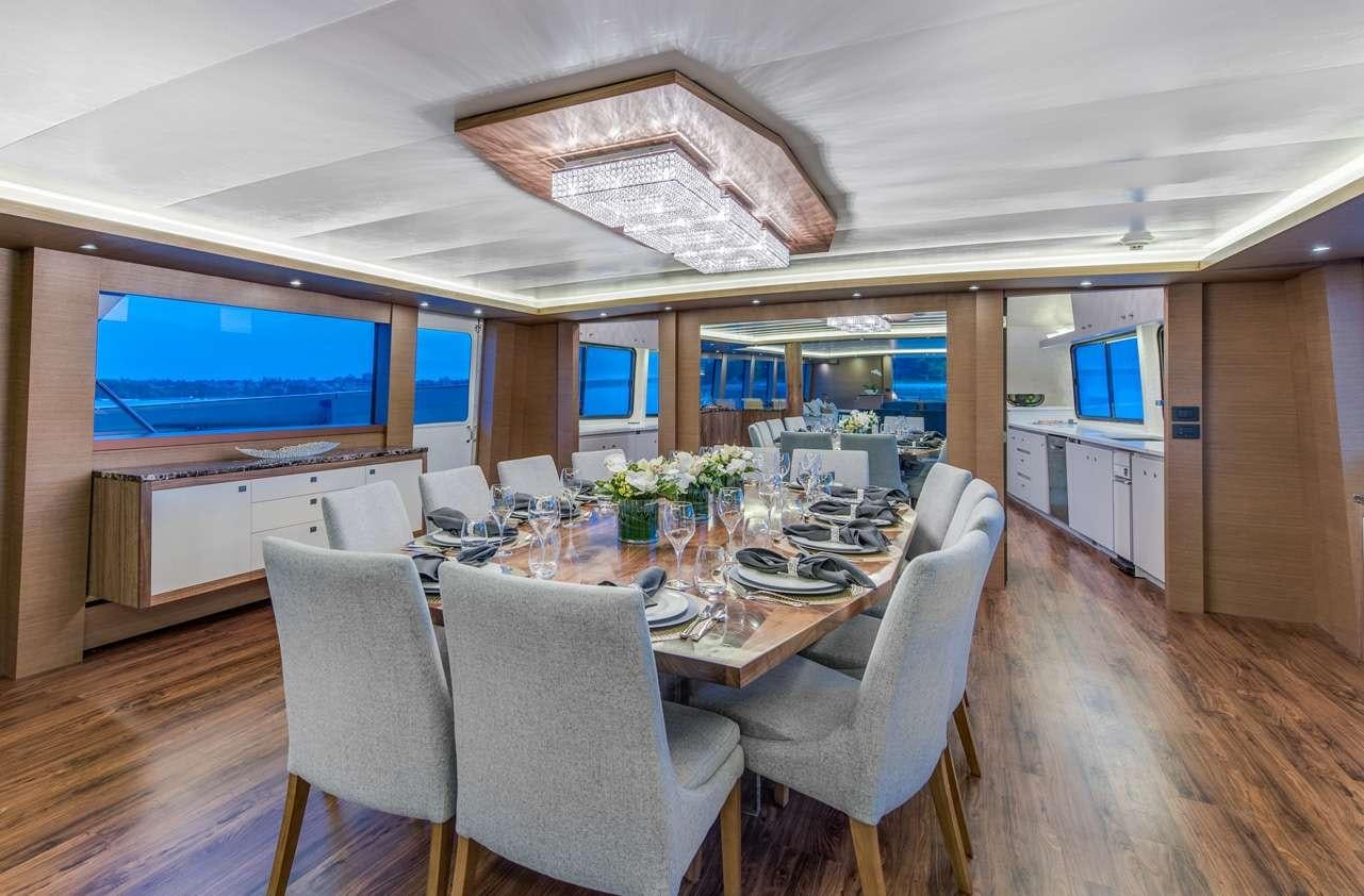 a dining room with a large table aboard ASCENTE Yacht for Charter