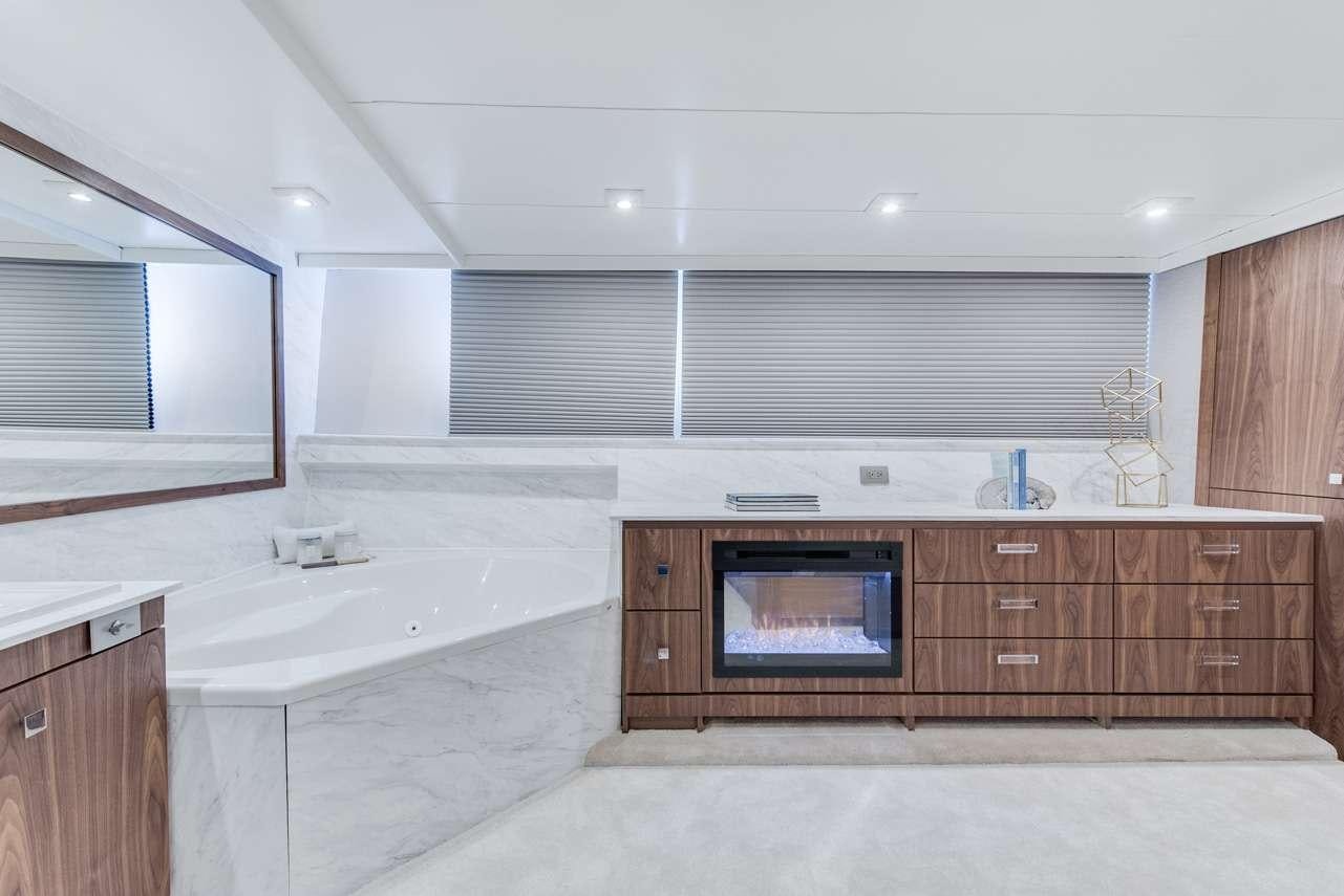 a large bathroom with a large jacuzzi tub aboard ASCENTE Yacht for Charter
