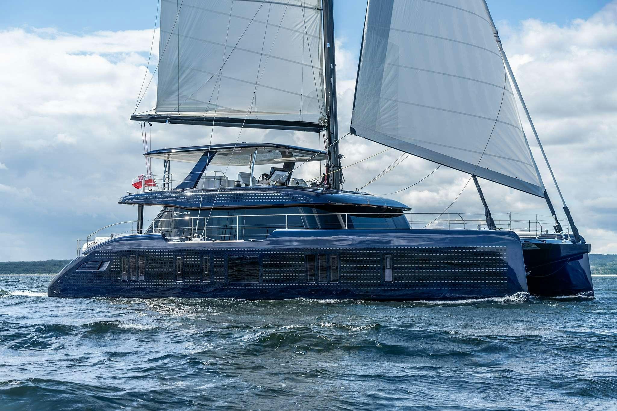 a large boat in the water aboard ONE PLANET Yacht for Charter