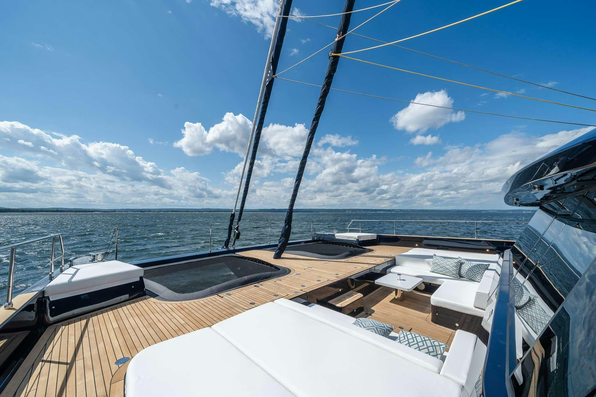a boat on the water aboard ONE PLANET Yacht for Charter