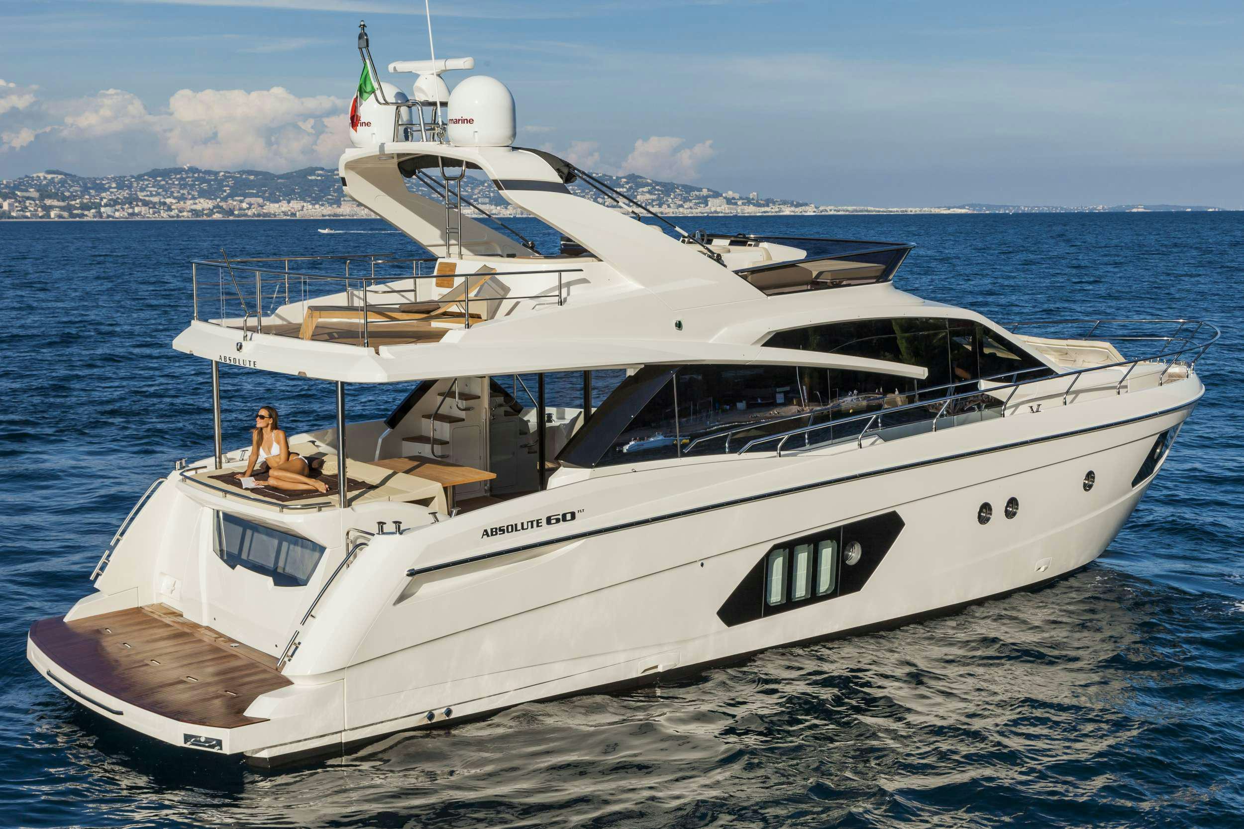 a white yacht on the water aboard ABSOLUTE Yacht for Charter