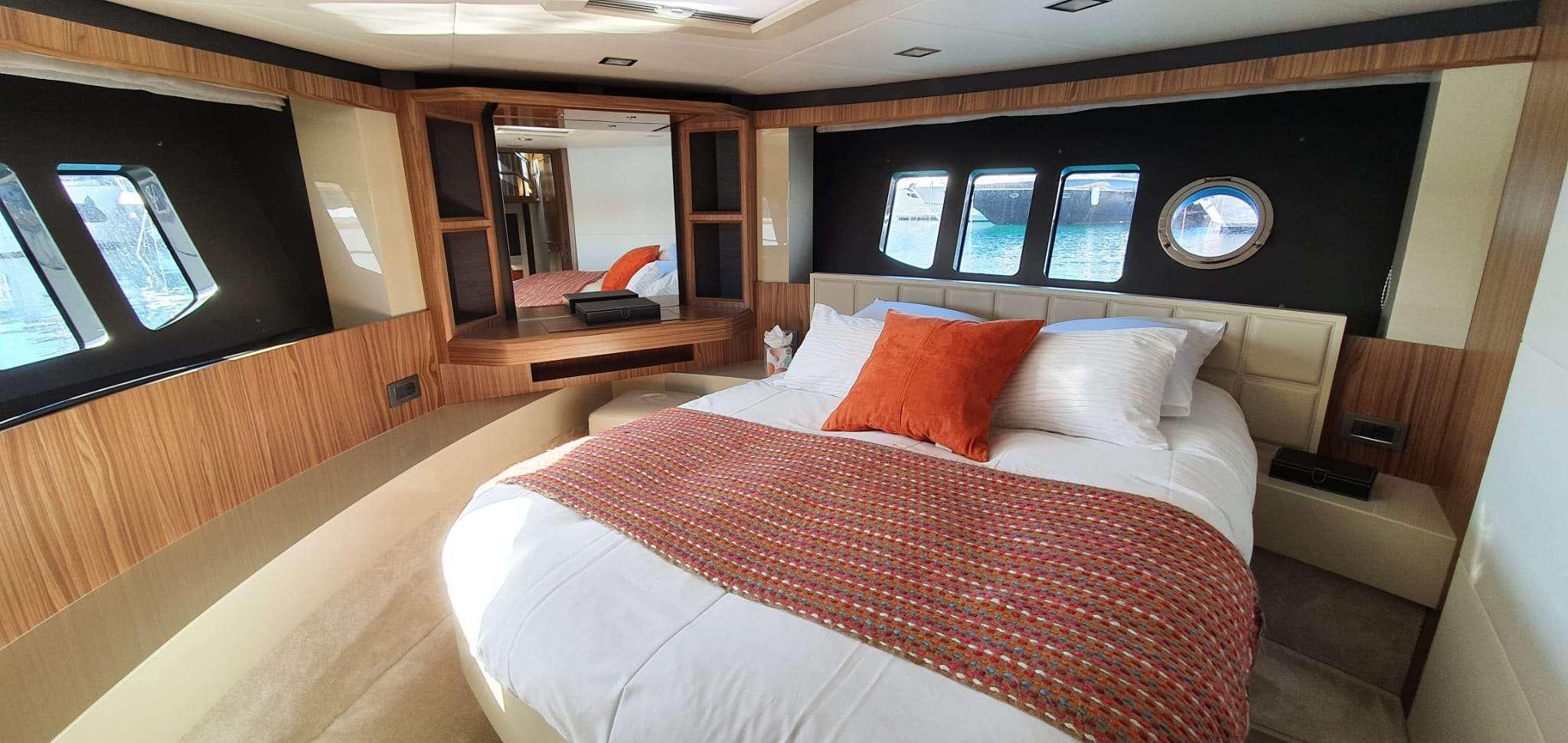 a bed in a room aboard ABSOLUTE Yacht for Charter