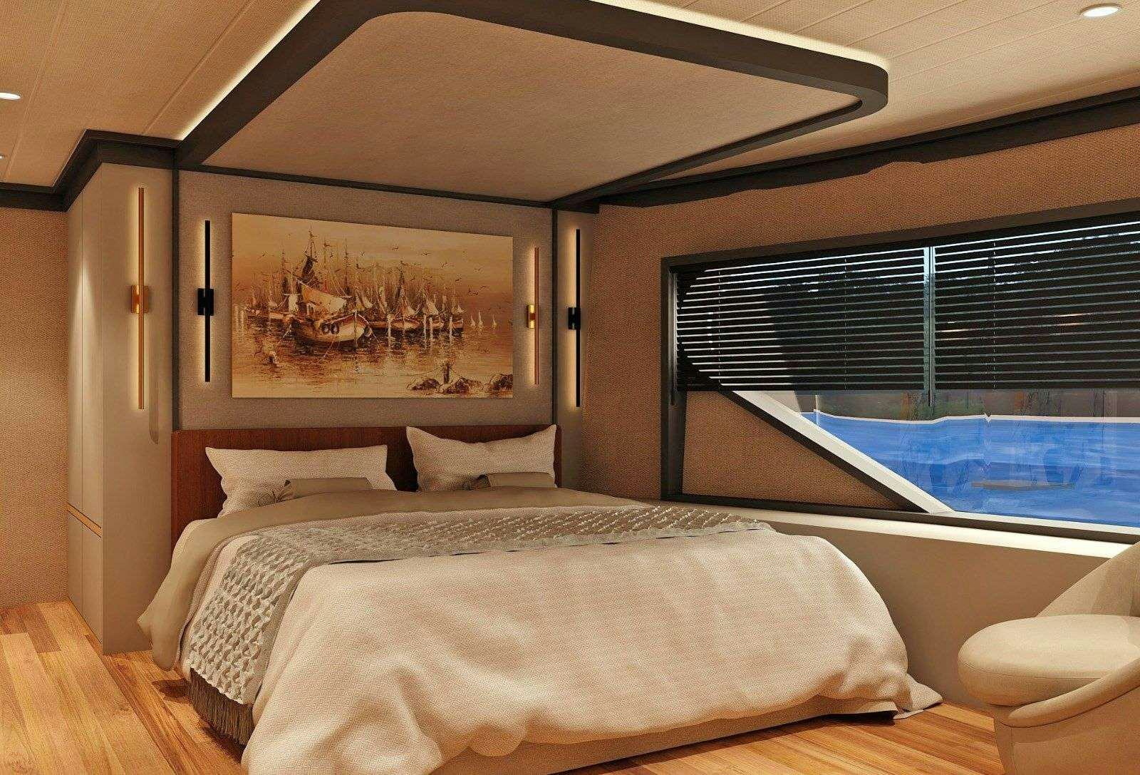 a bed in a room aboard NAYK 3 Yacht for Charter