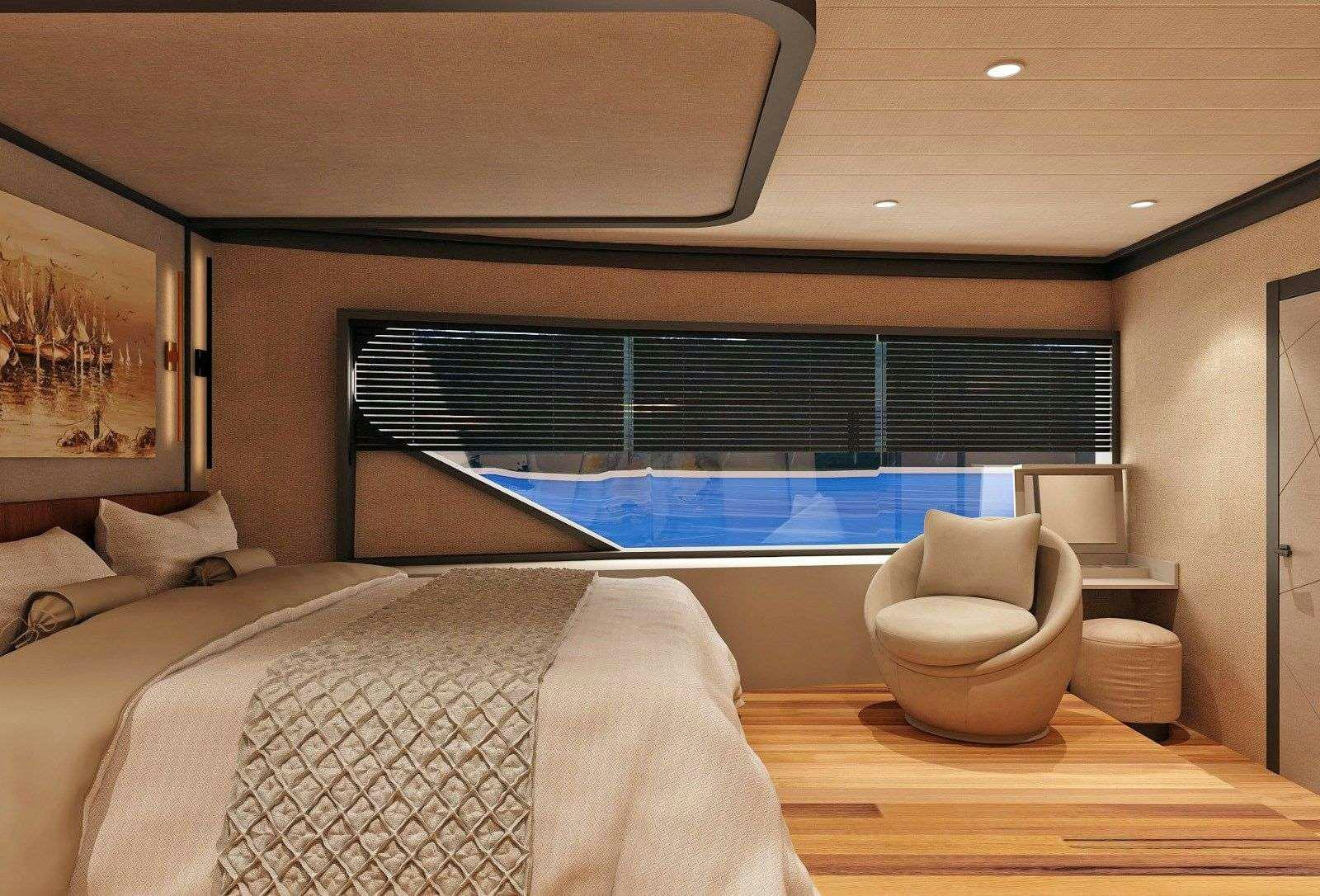 a room with a bed and a chair aboard NAYK 3 Yacht for Charter