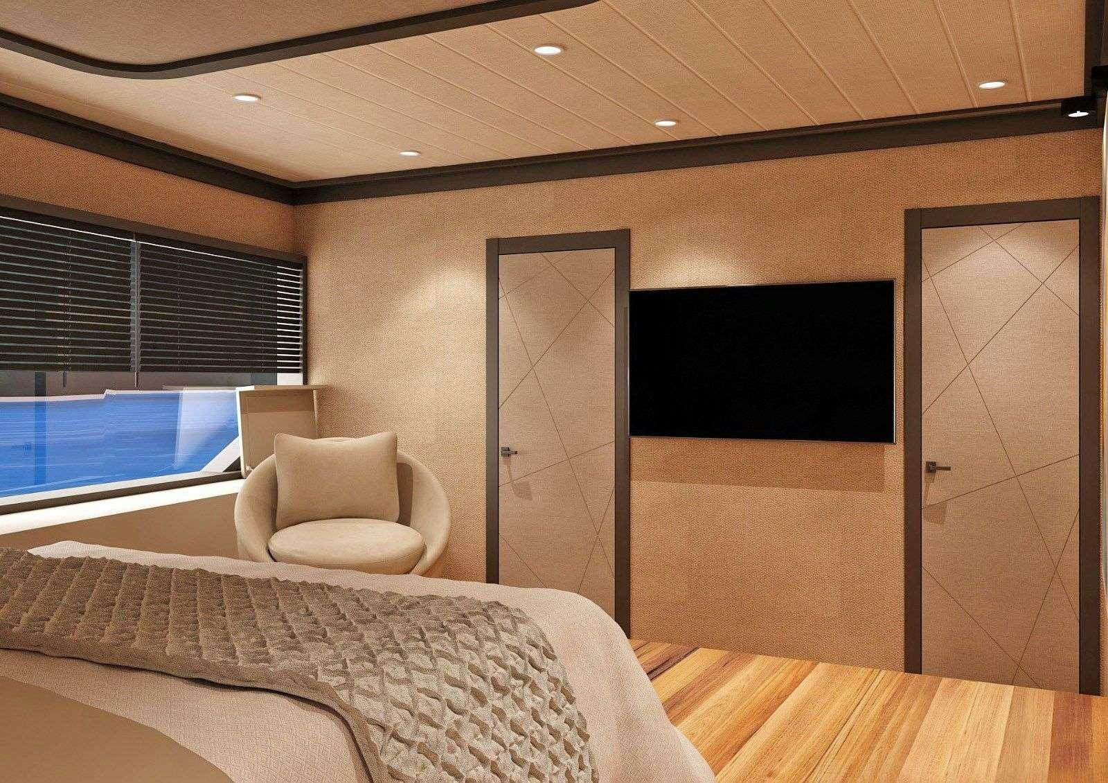 a room with a bed and a television aboard NAYK 3 Yacht for Charter