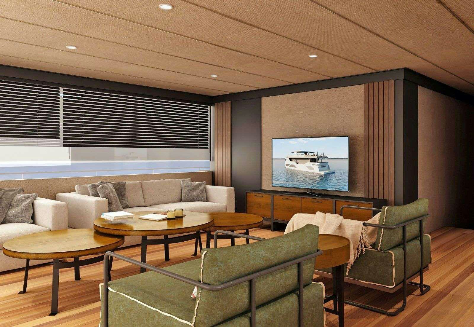 a living room with a large screen aboard NAYK 3 Yacht for Charter