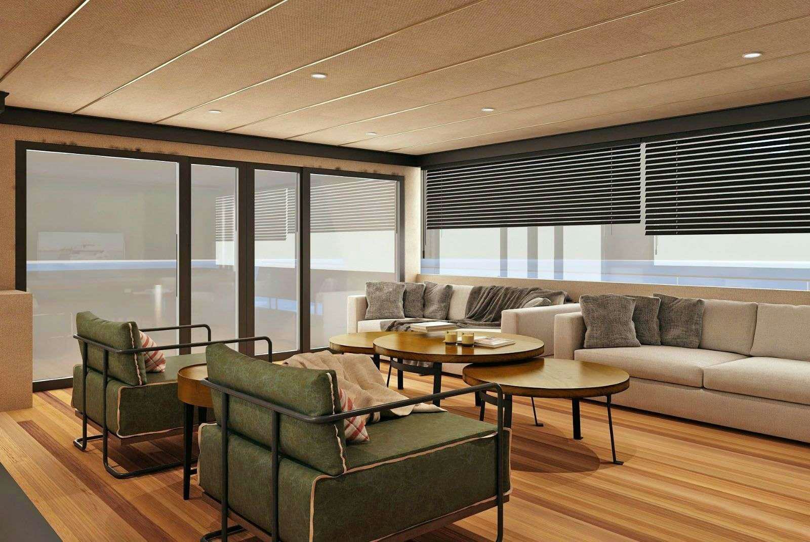 a living room with a couch and a table aboard NAYK 3 Yacht for Charter