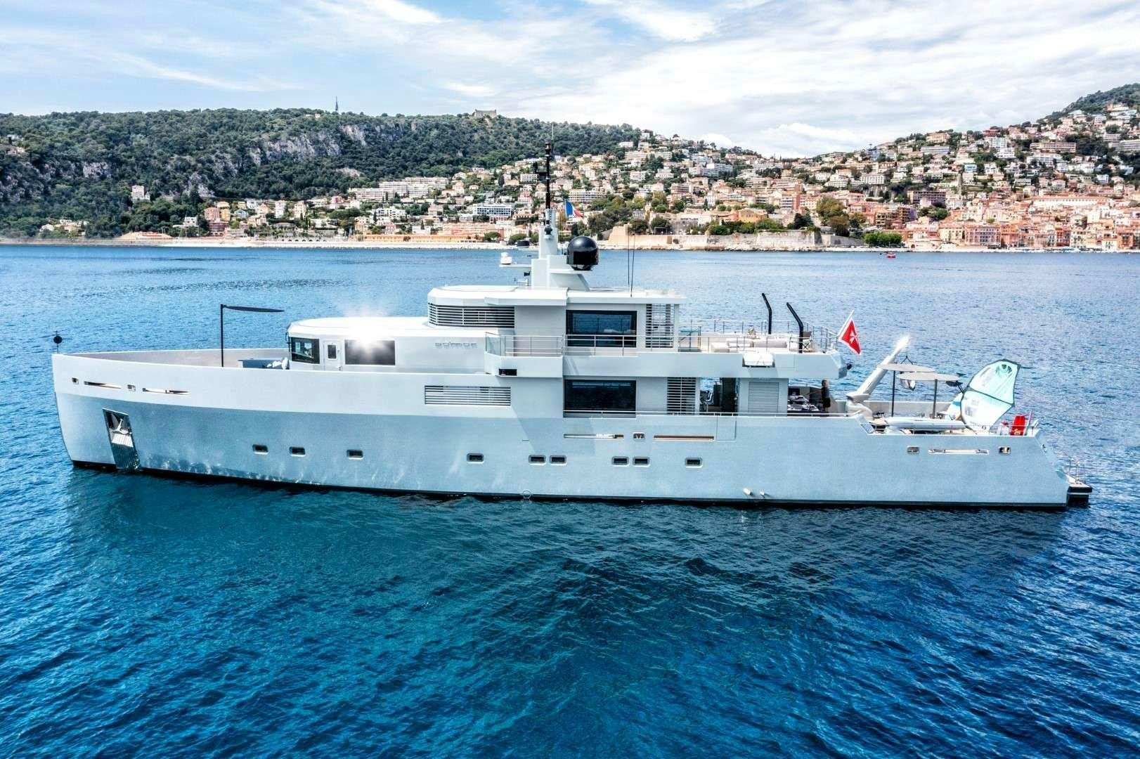a white boat in the water aboard SO'MAR Yacht for Charter
