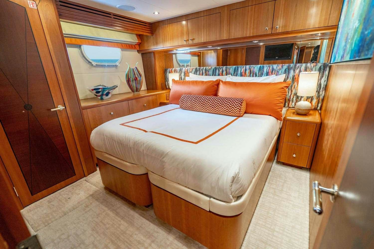 a bed in a room aboard INEVITABLE Yacht for Charter