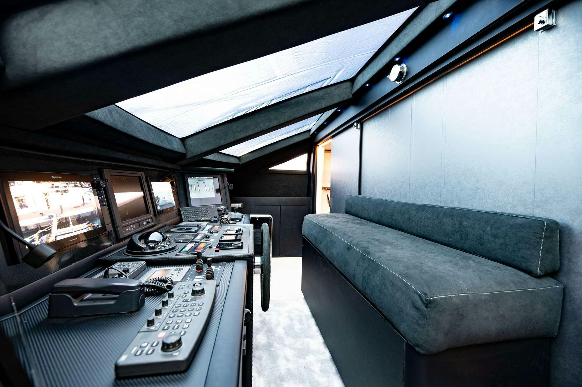a vehicle with a keyboard and monitors aboard EVA Yacht for Charter
