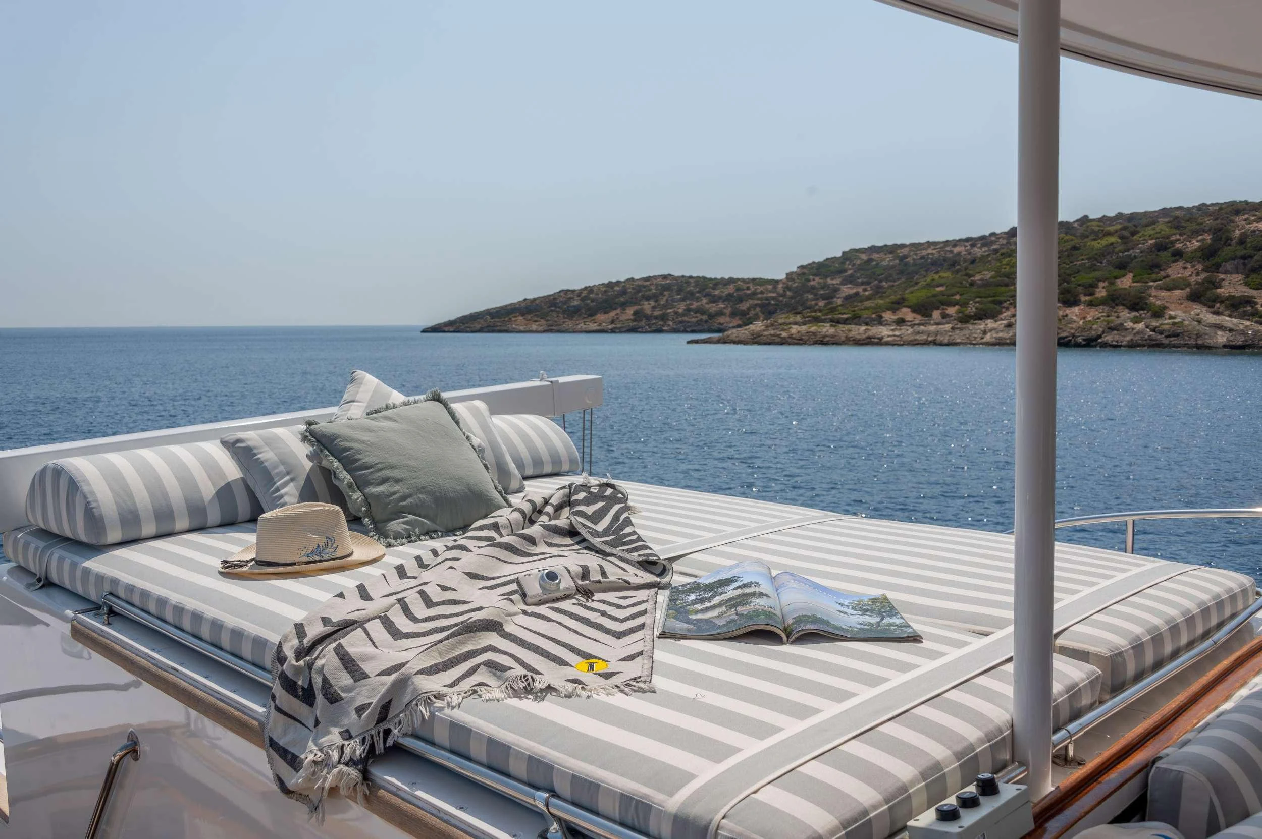 a bed on a boat aboard TAKA Yacht for Charter