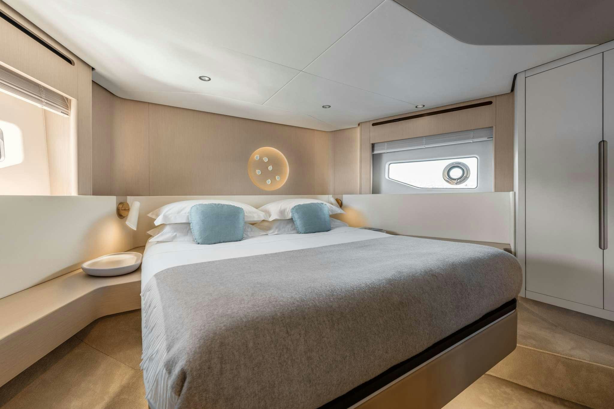 a bed in a room aboard DONNA Yacht for Charter
