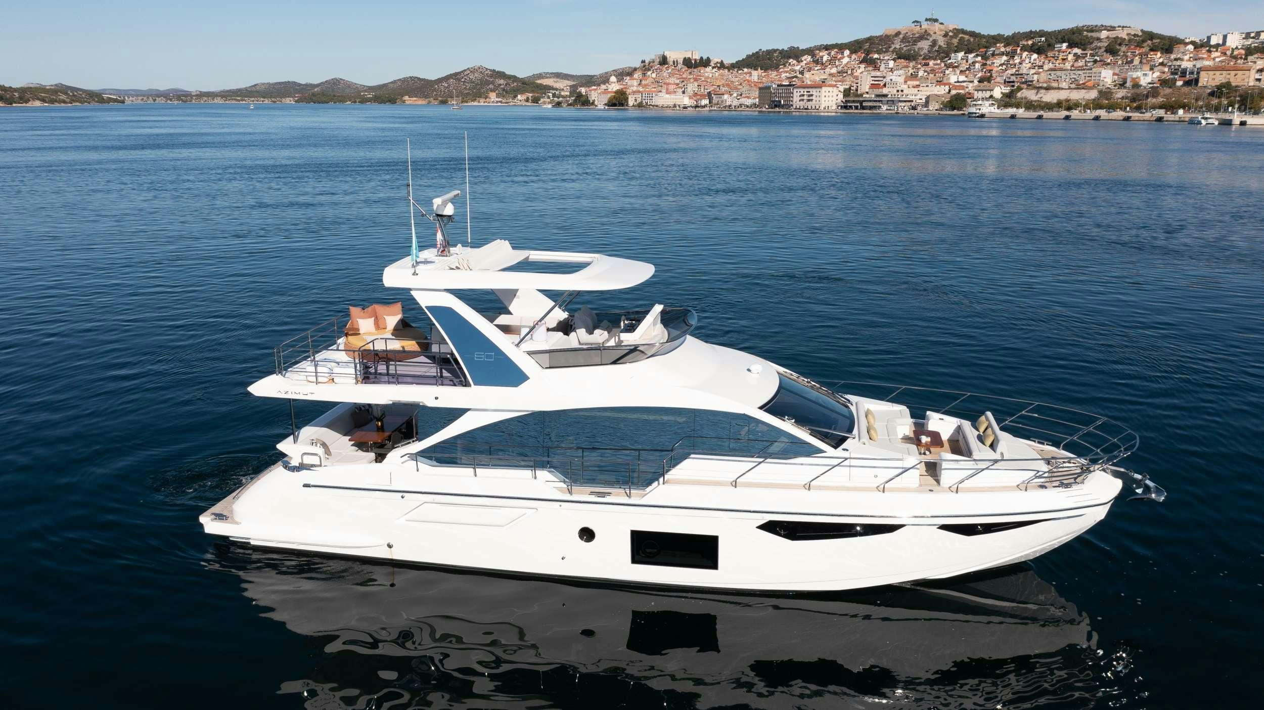 a white yacht in the water aboard ALIBABA Yacht for Charter