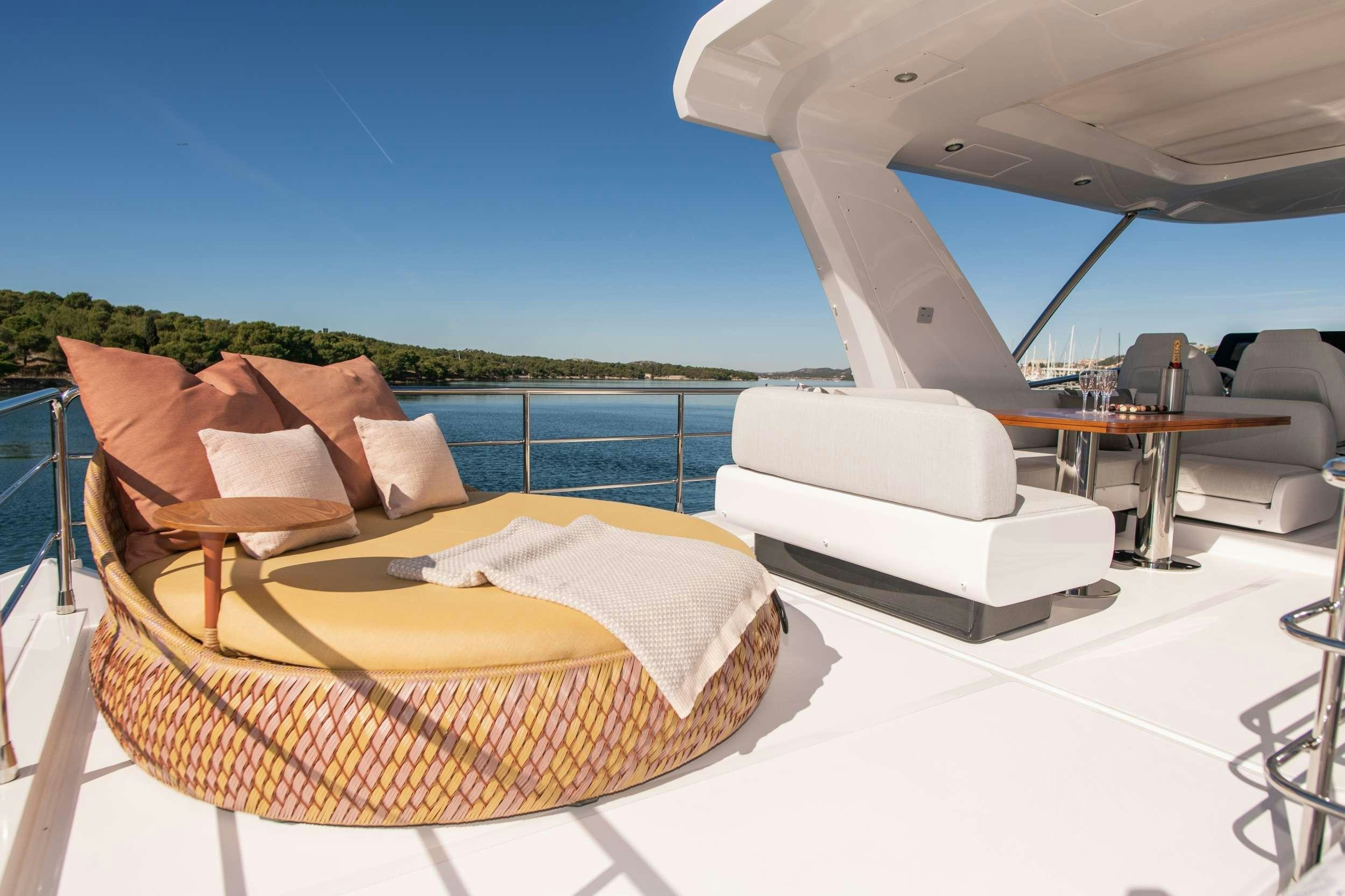 a bed on a deck aboard ALIBABA Yacht for Charter