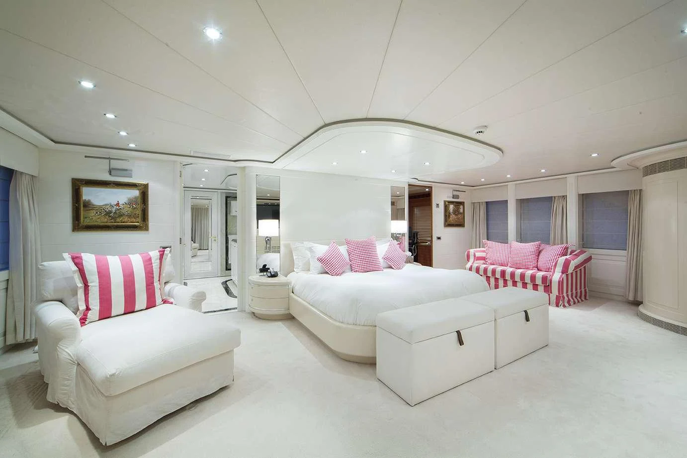 The master stateroom features a spacious layout with elegant furnishings and luxurious bedding. aboard MAC BREW Yacht for Charter