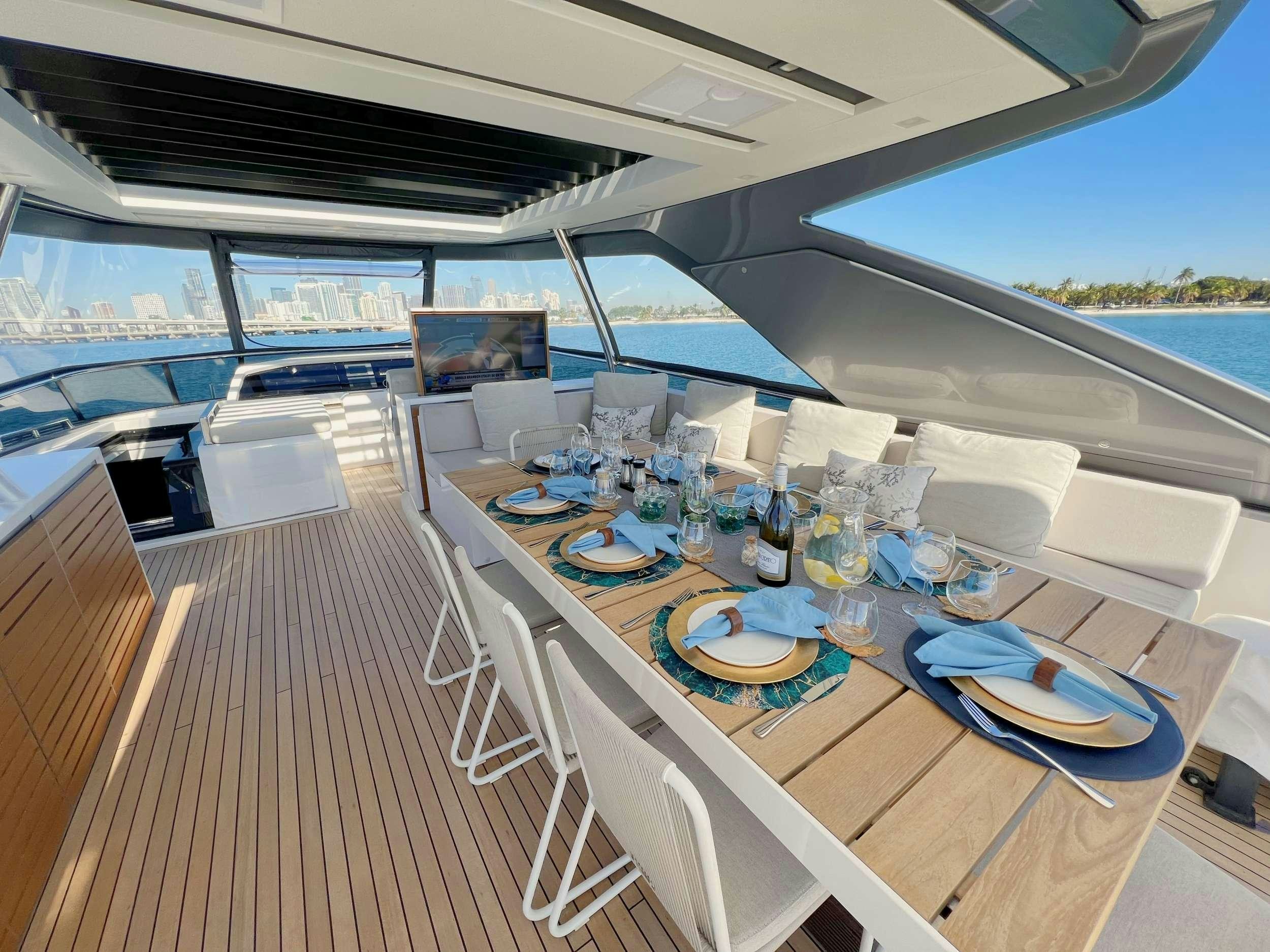 a table set for a meal aboard C-DAZE Yacht for Charter