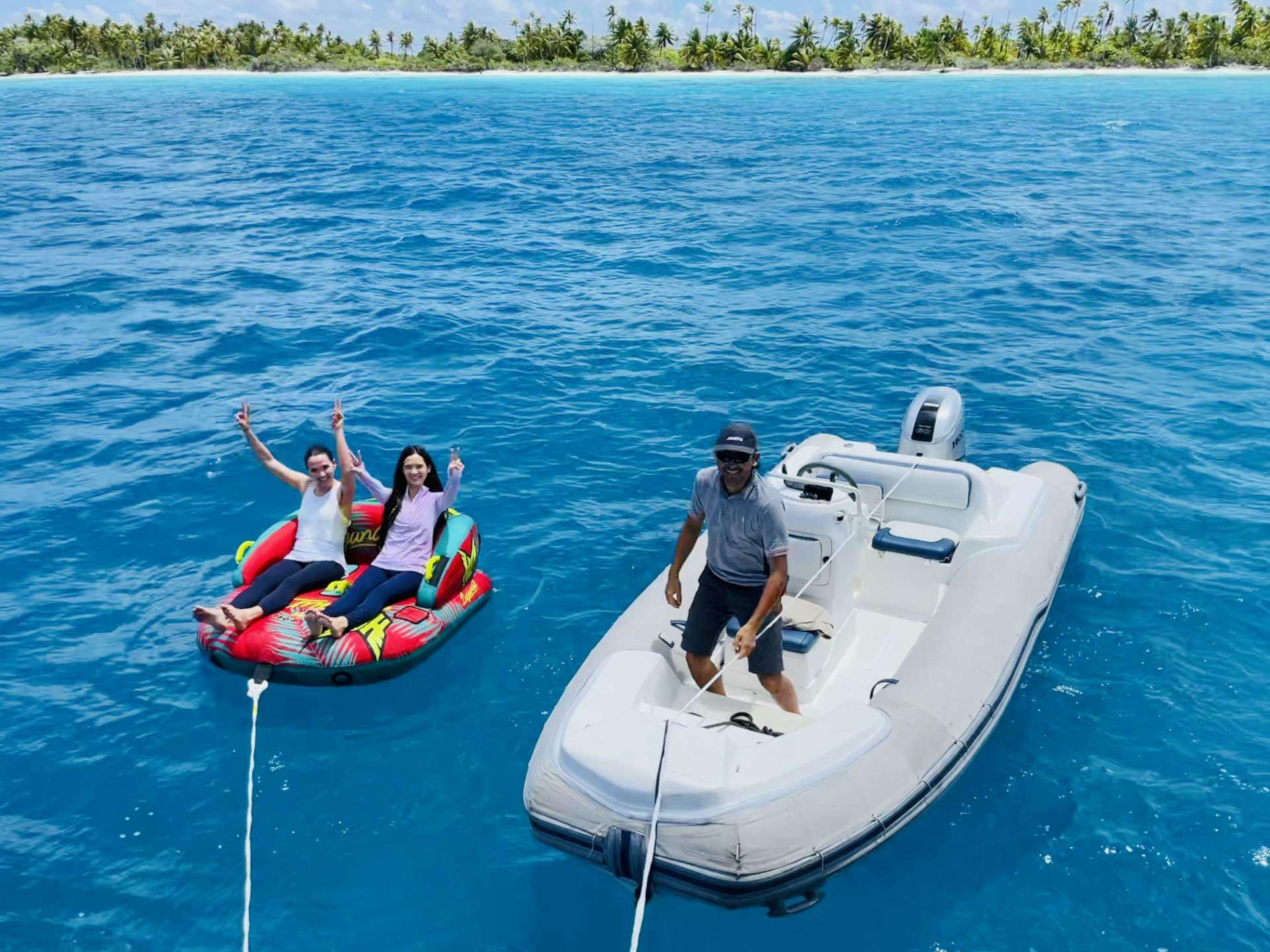a group of people on a boat aboard YELLOW Yacht for Charter