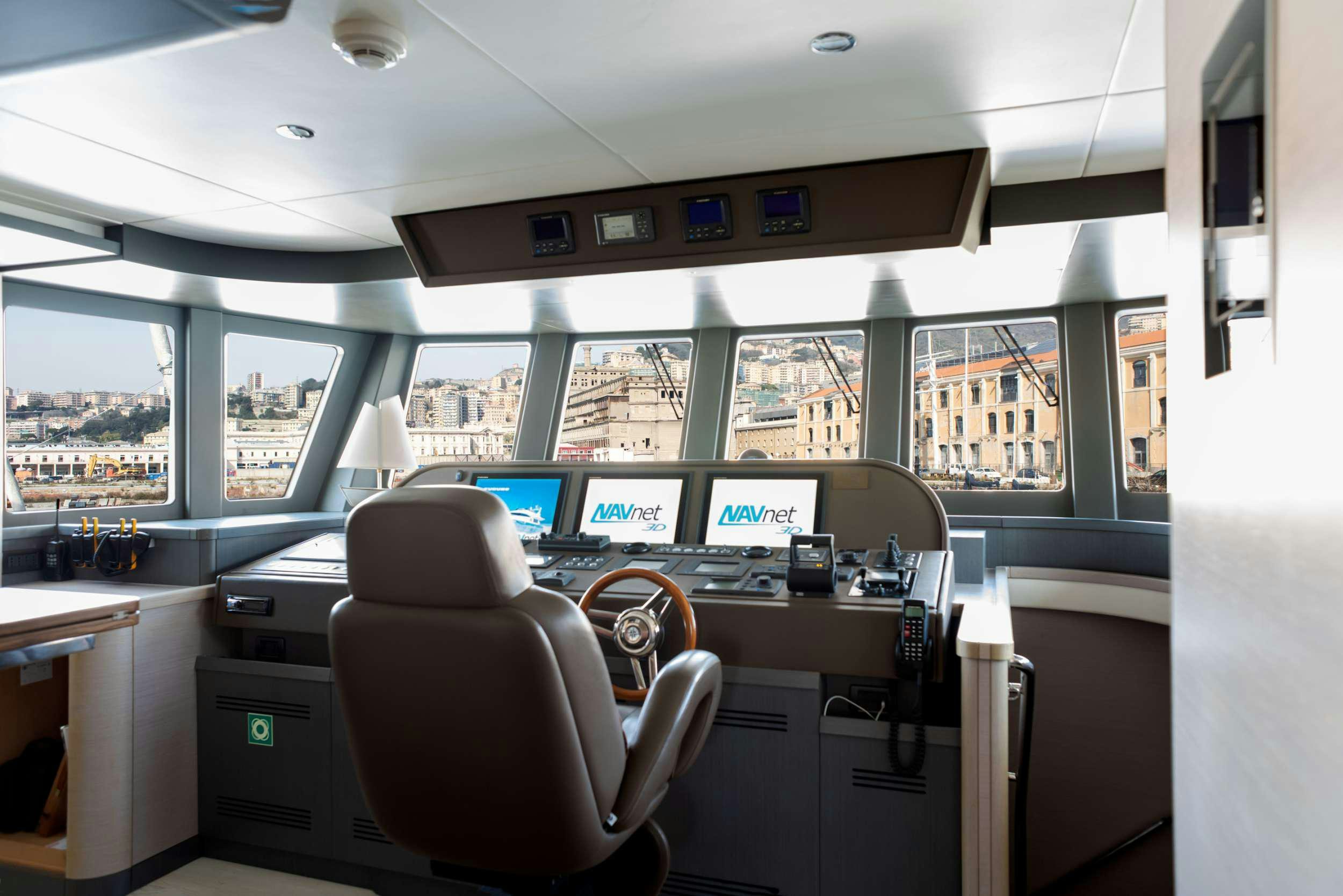 inside of a vehicle with a view of the city aboard GRANIL Yacht for Charter