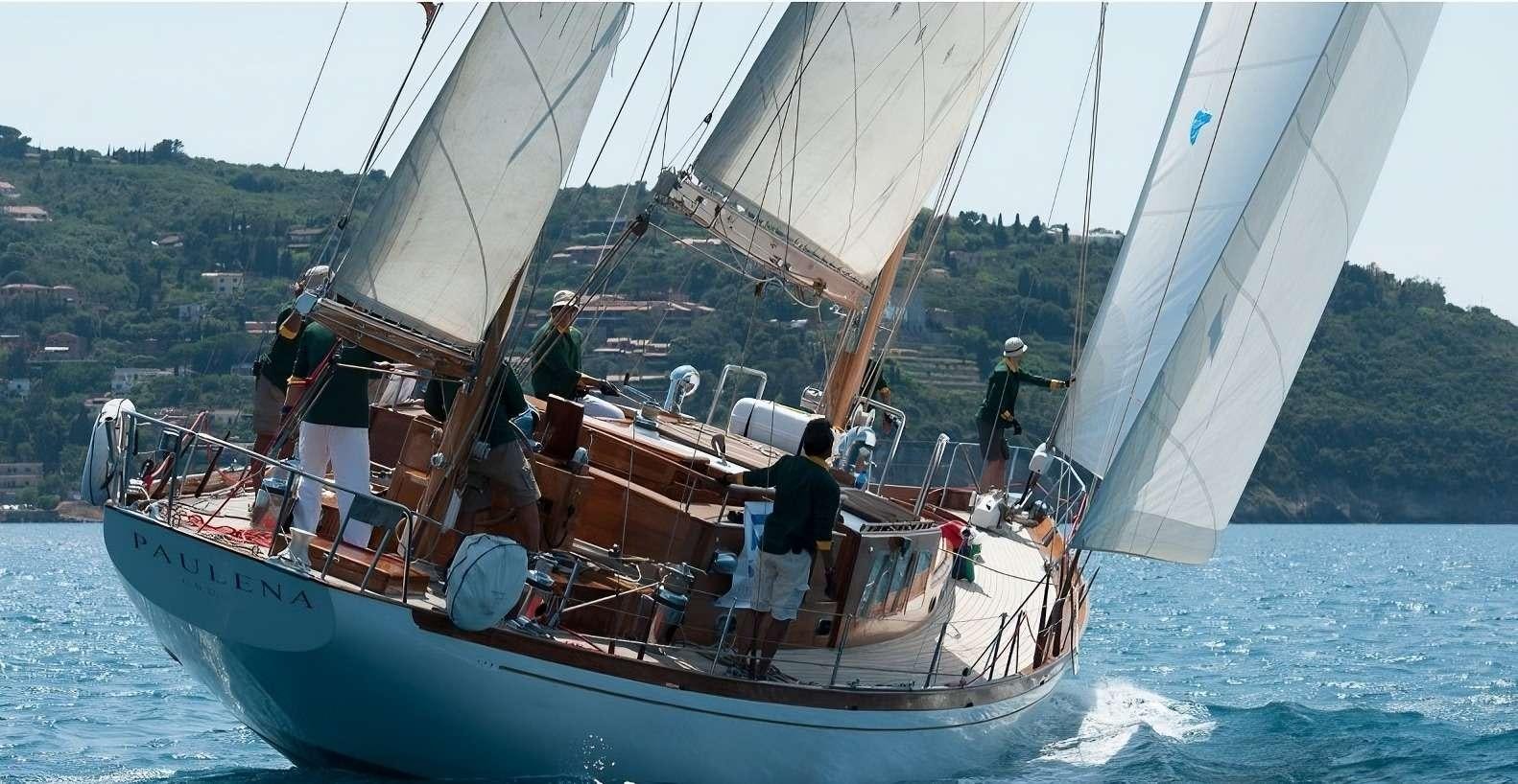 a group of people sailing on a sailboat aboard PAULENA Yacht for Charter