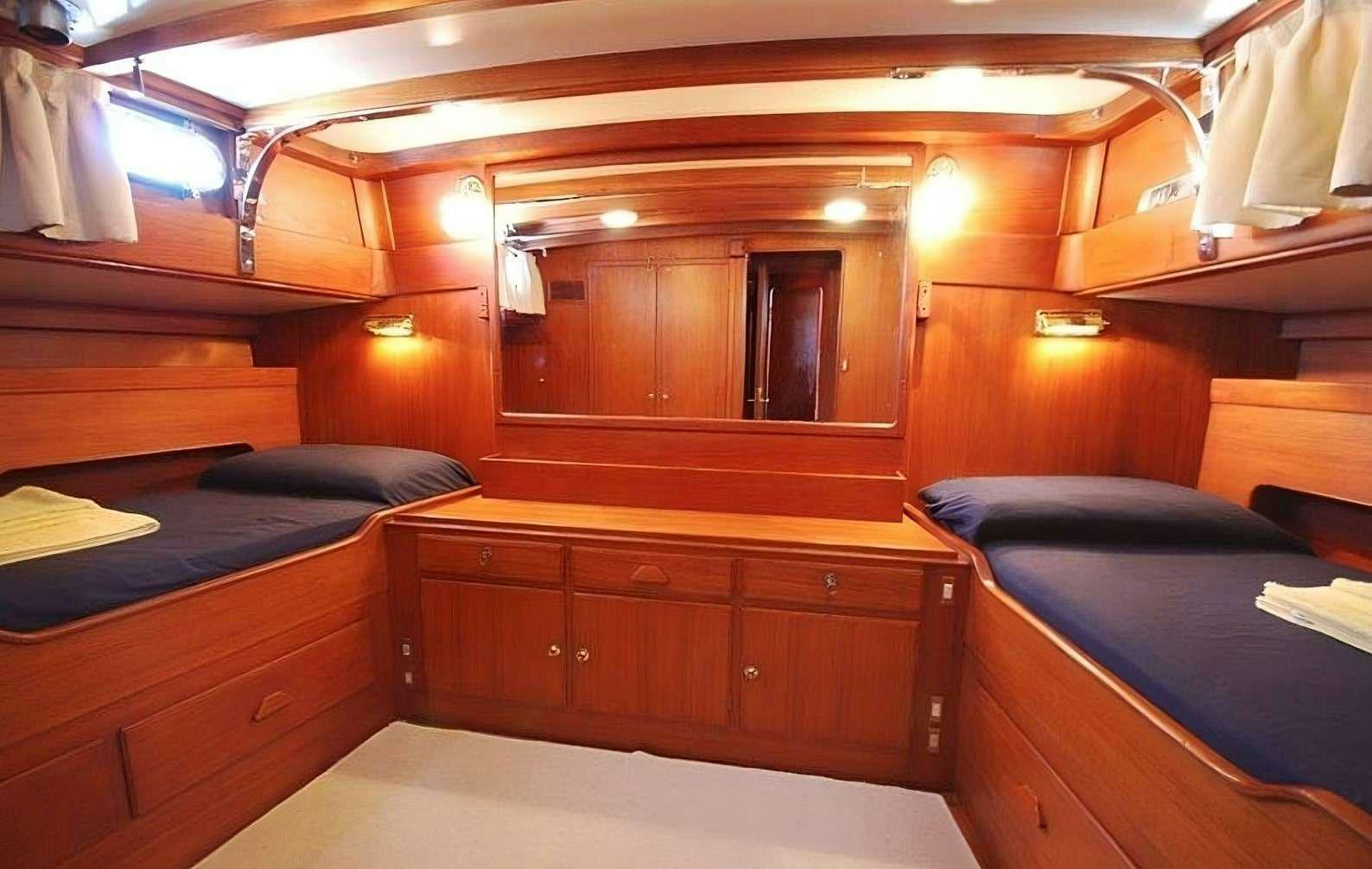 a room with bunk beds aboard PAULENA Yacht for Charter