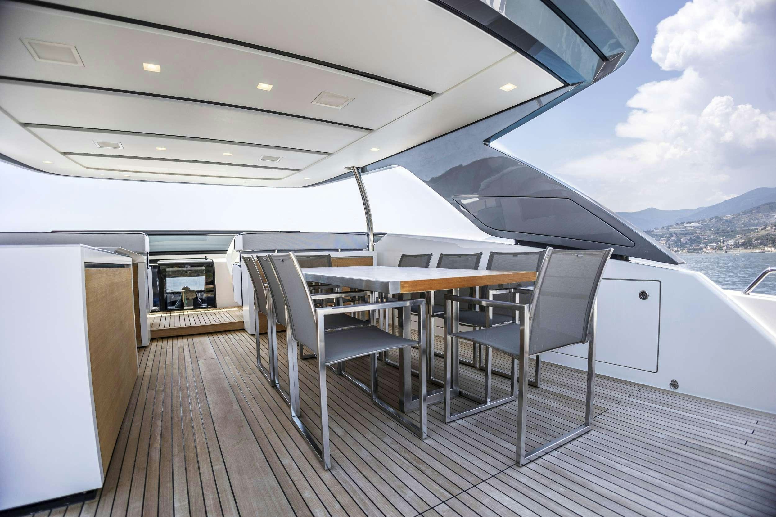 a boat on a deck aboard AMAN Yacht for Charter