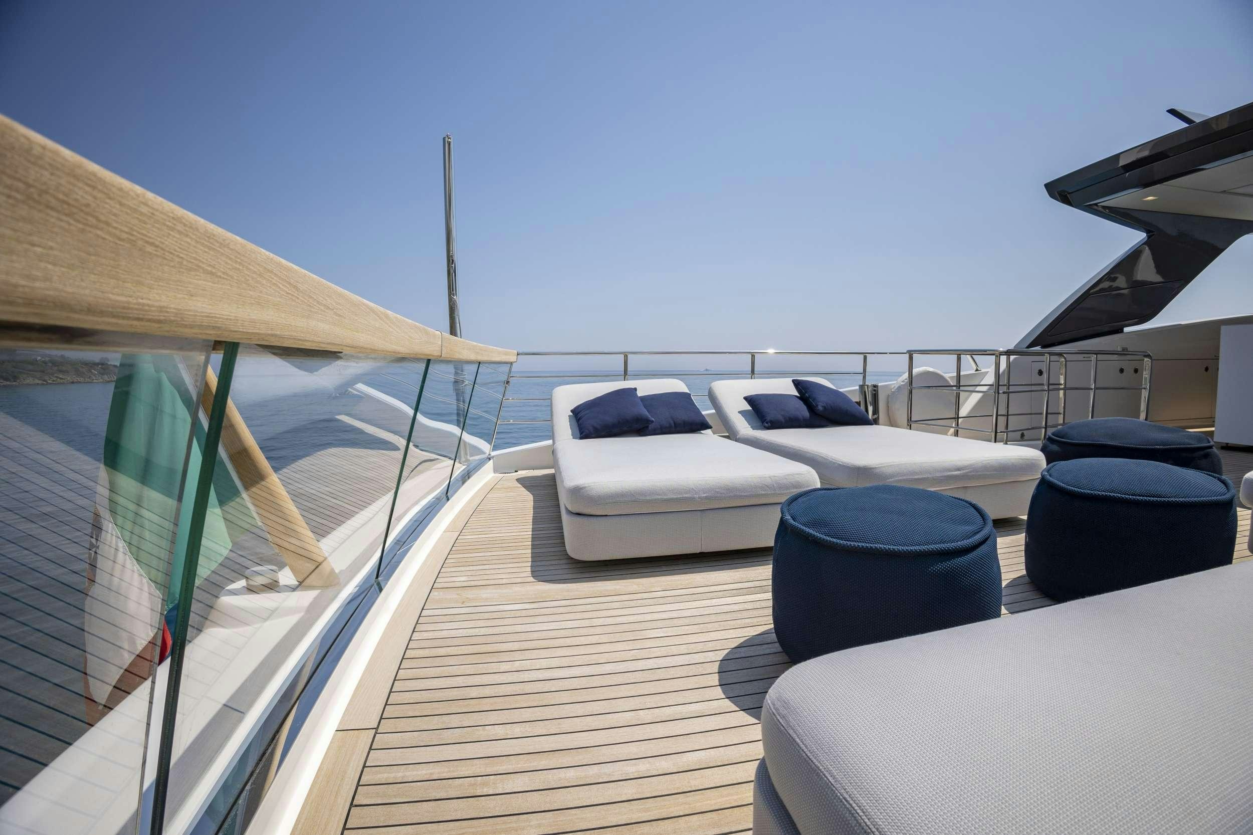 a boat on a deck aboard AMAN Yacht for Charter