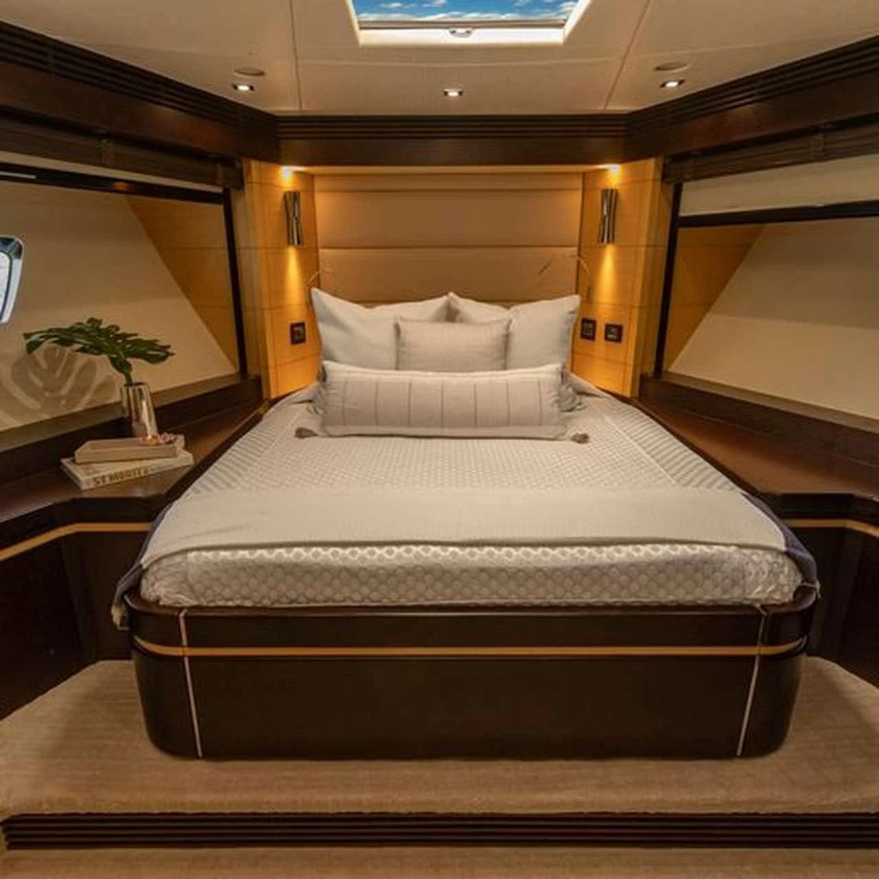 a bed in a room aboard COSTASOL Yacht for Charter