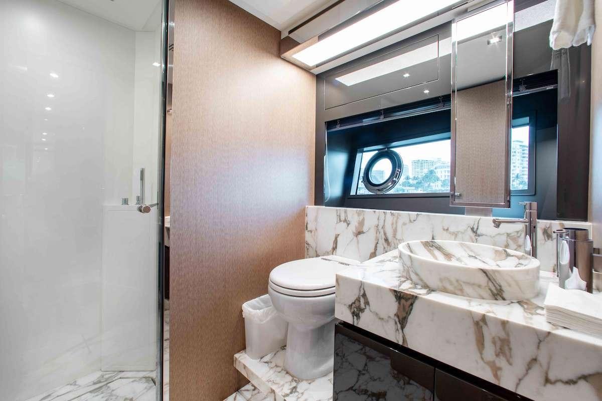 a bathroom with a sink and toilet aboard 2QUICK Yacht for Charter