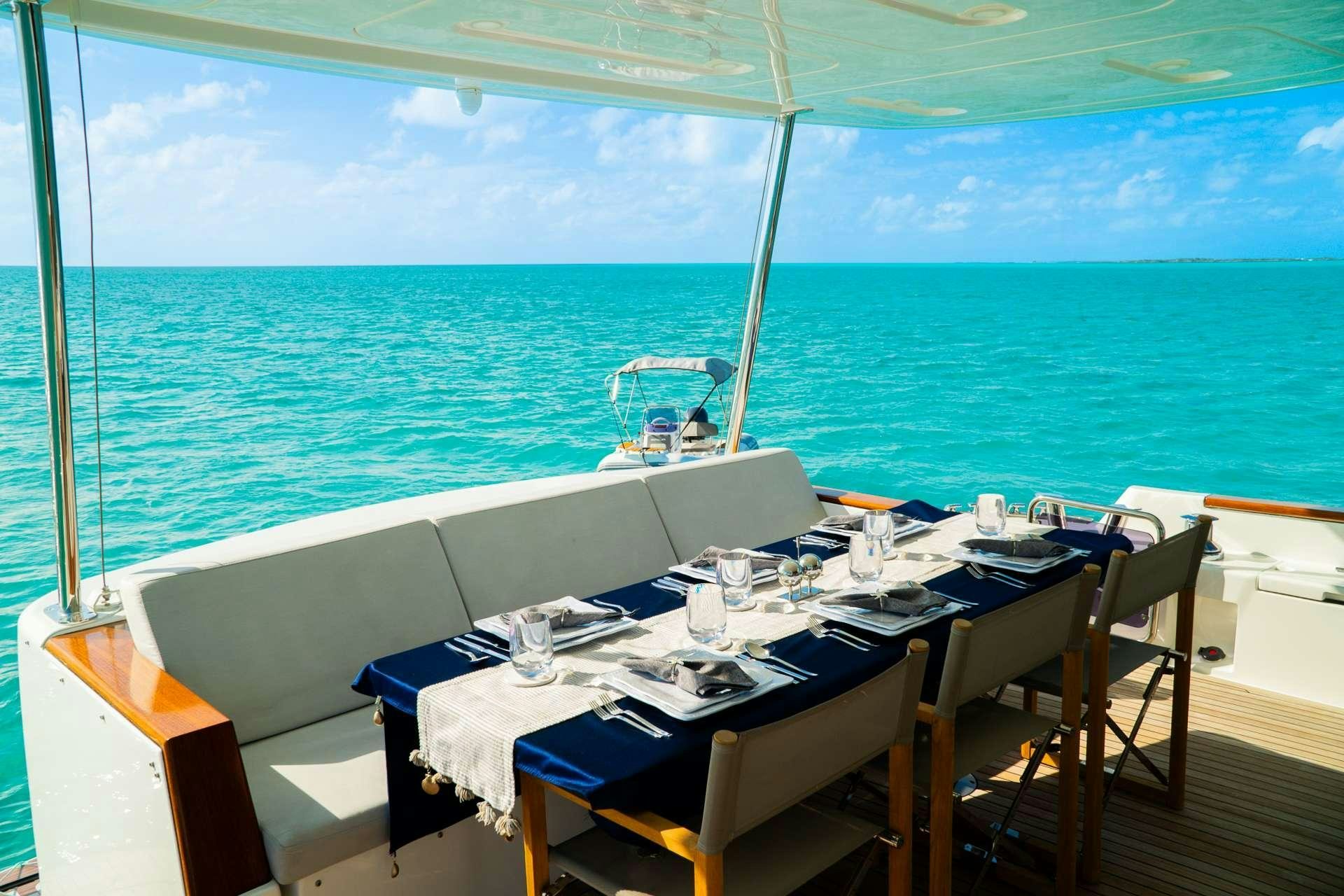 a table on a boat aboard NORMAN'S T4 Yacht for Charter