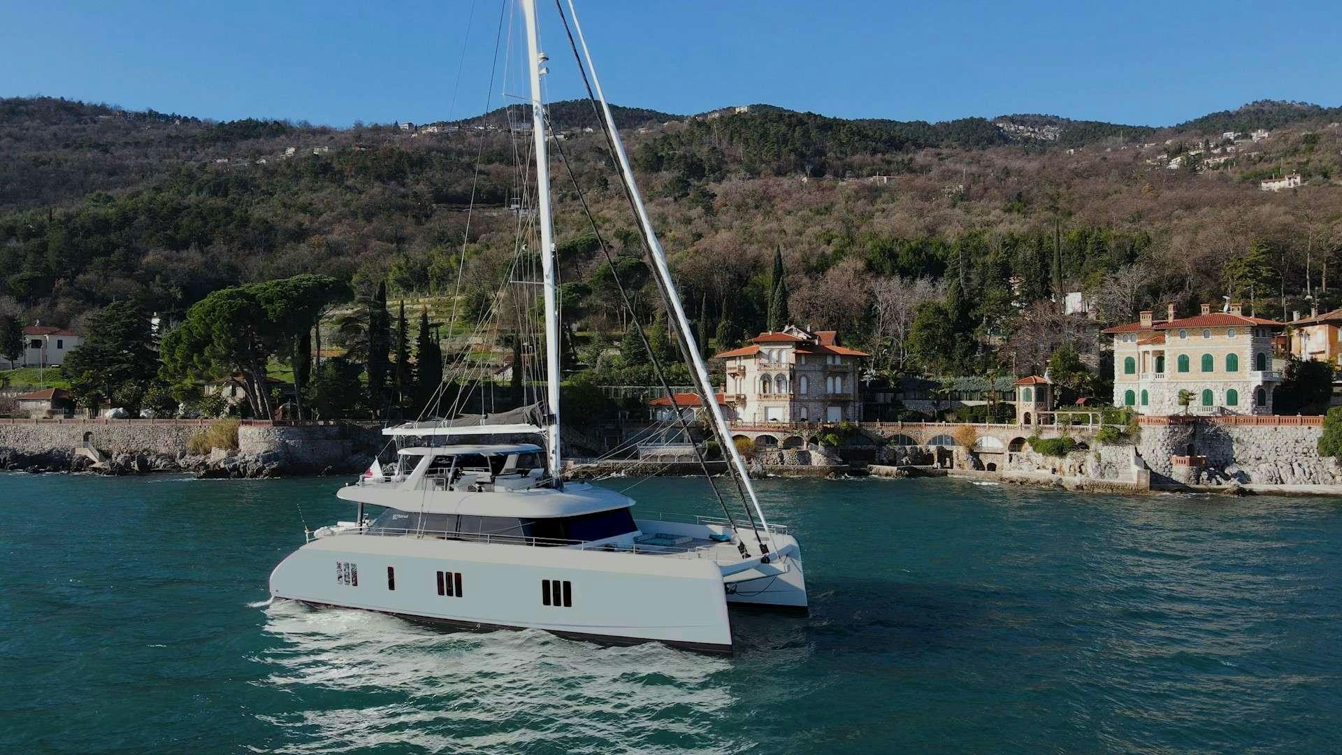 a boat sailing on the water aboard NALA ONE Yacht for Charter