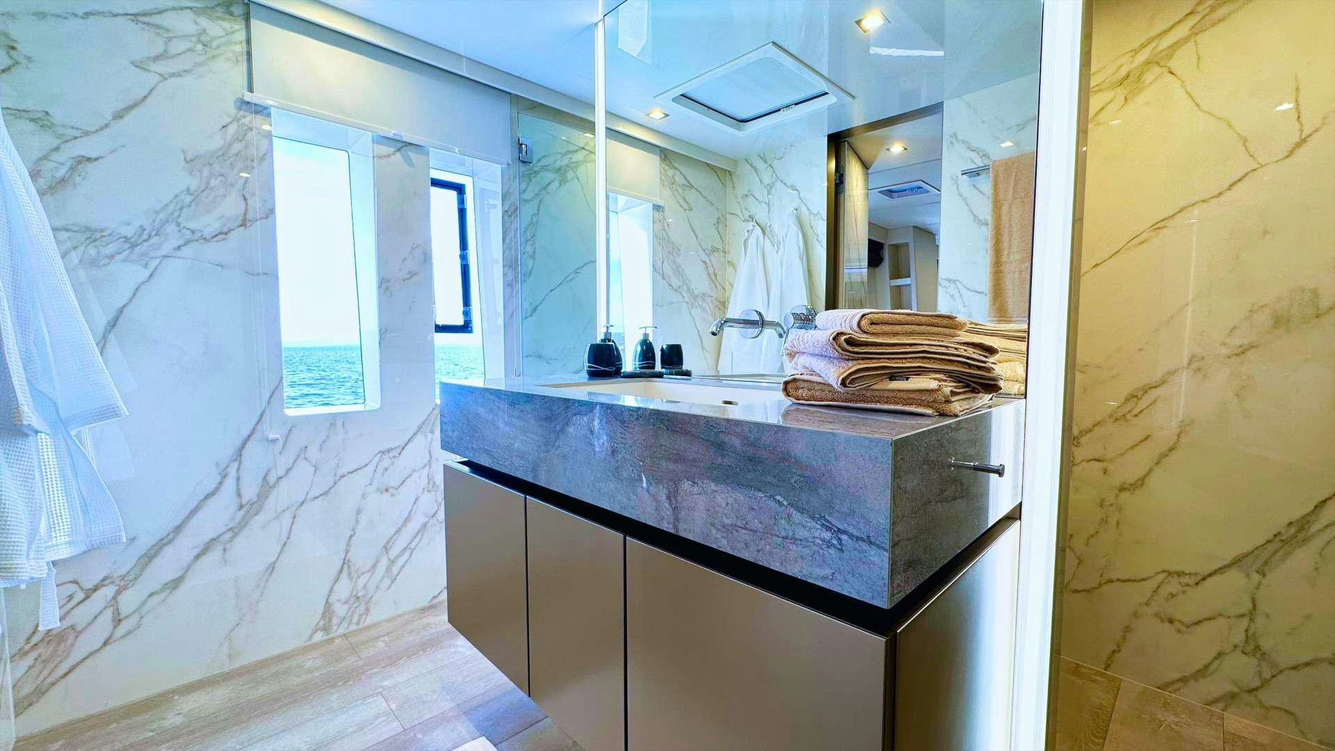 a kitchen with a countertop aboard NALA ONE Yacht for Charter