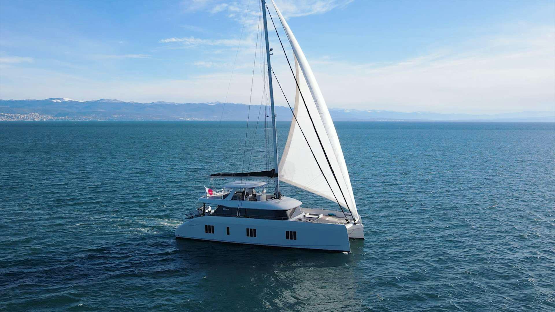 a white boat in the water aboard NALA ONE Yacht for Charter