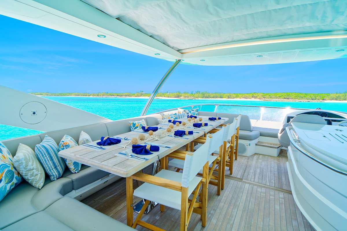 a table on a deck aboard DADDY'S $ Yacht for Charter