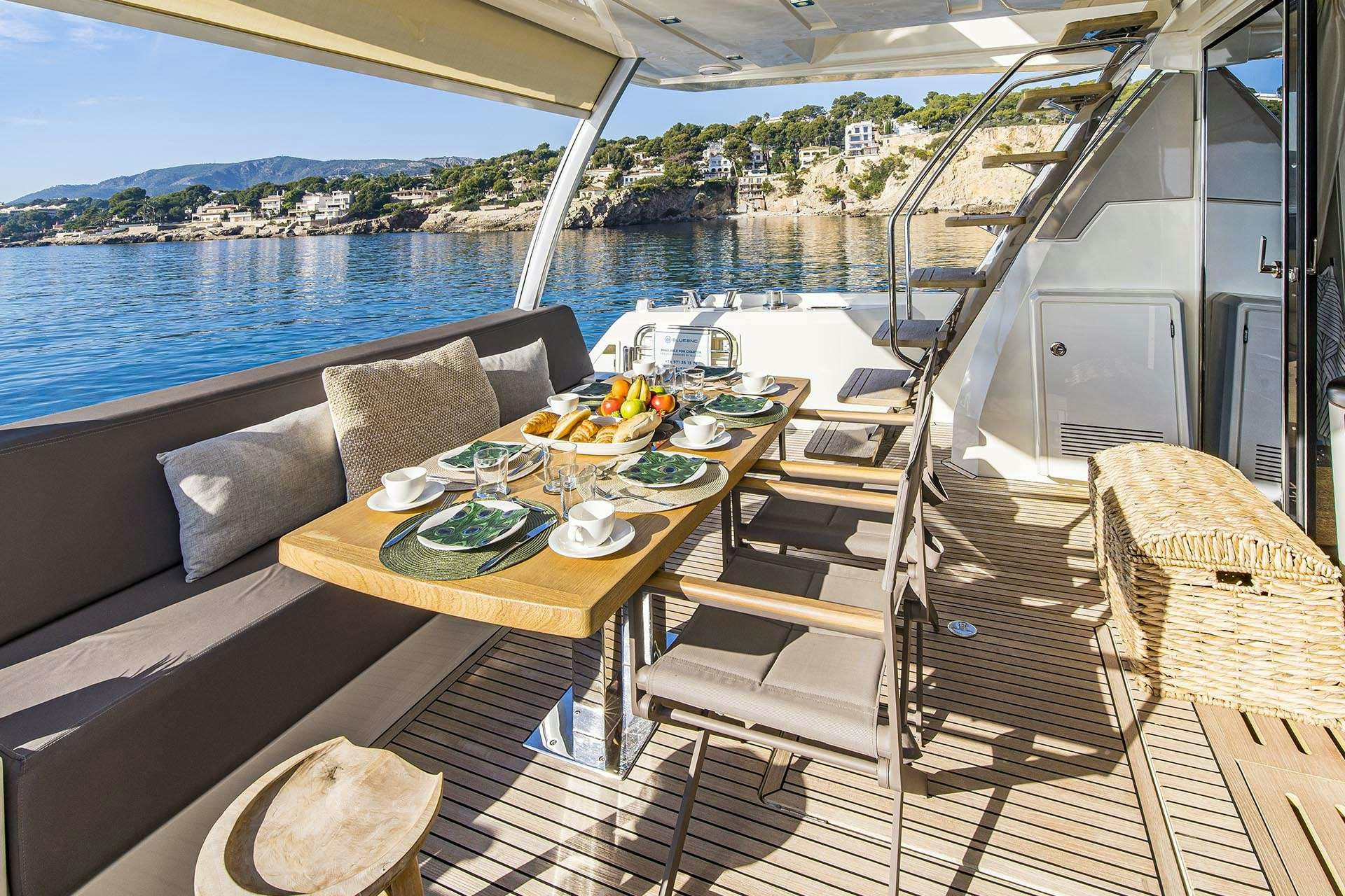 a table on a boat aboard BLUE M Yacht for Charter