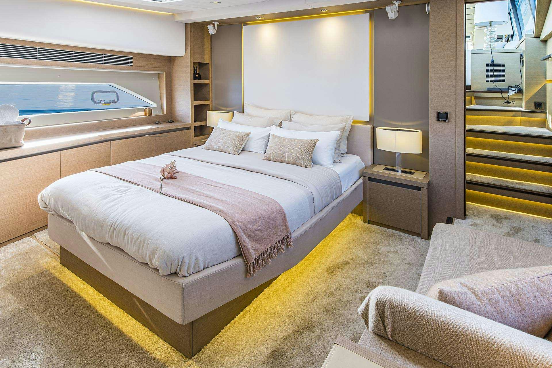 a bed in a hotel room aboard BLUE M Yacht for Charter